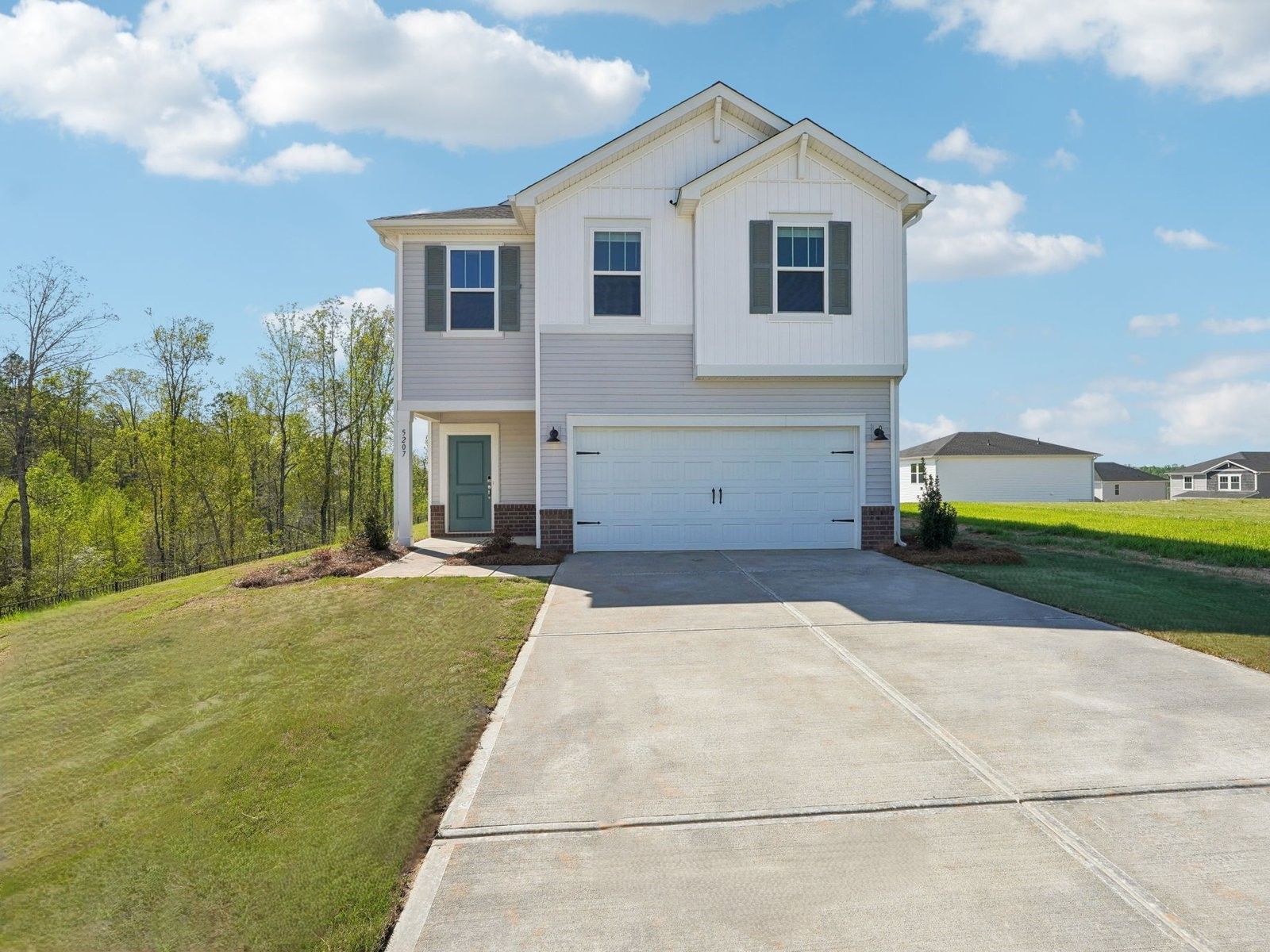 Front Exterior:Welcome to the Edenton floorplan at a Meritage Homes community in Charlotte, NC.