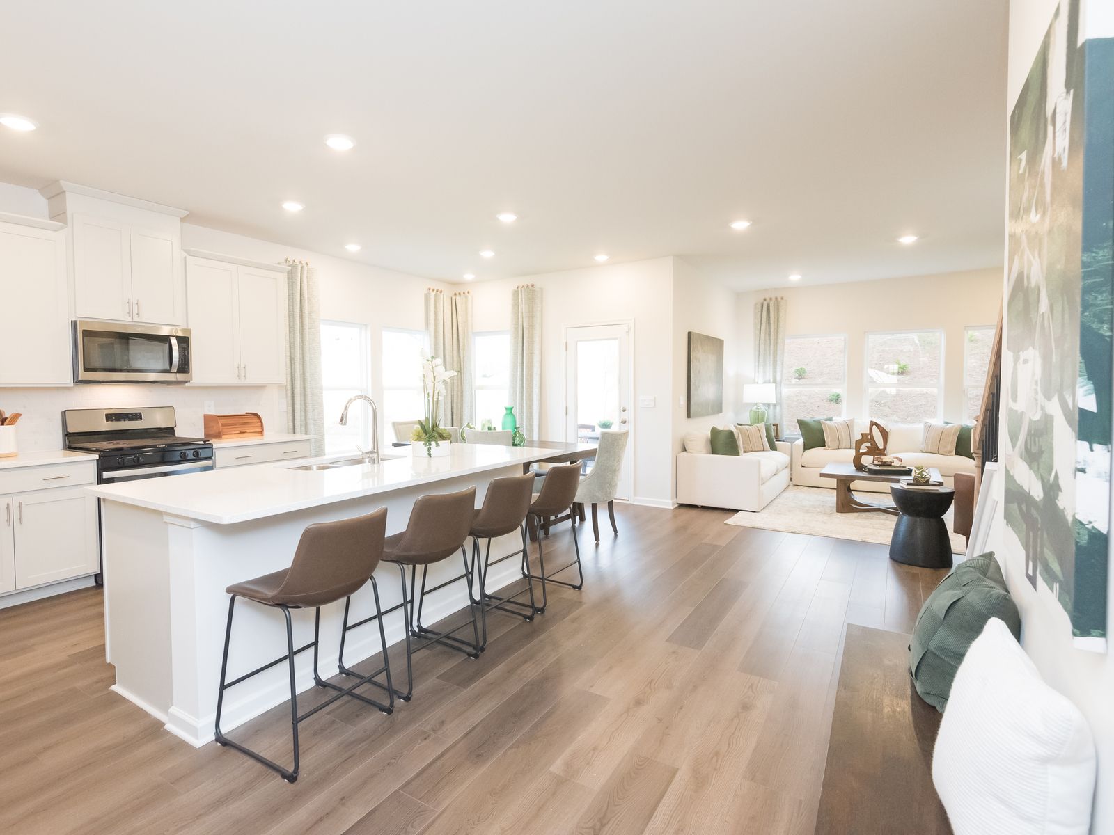 Main Floor:Enjoy tall windows that bring in light and an open floorplan that flows seamlessly.