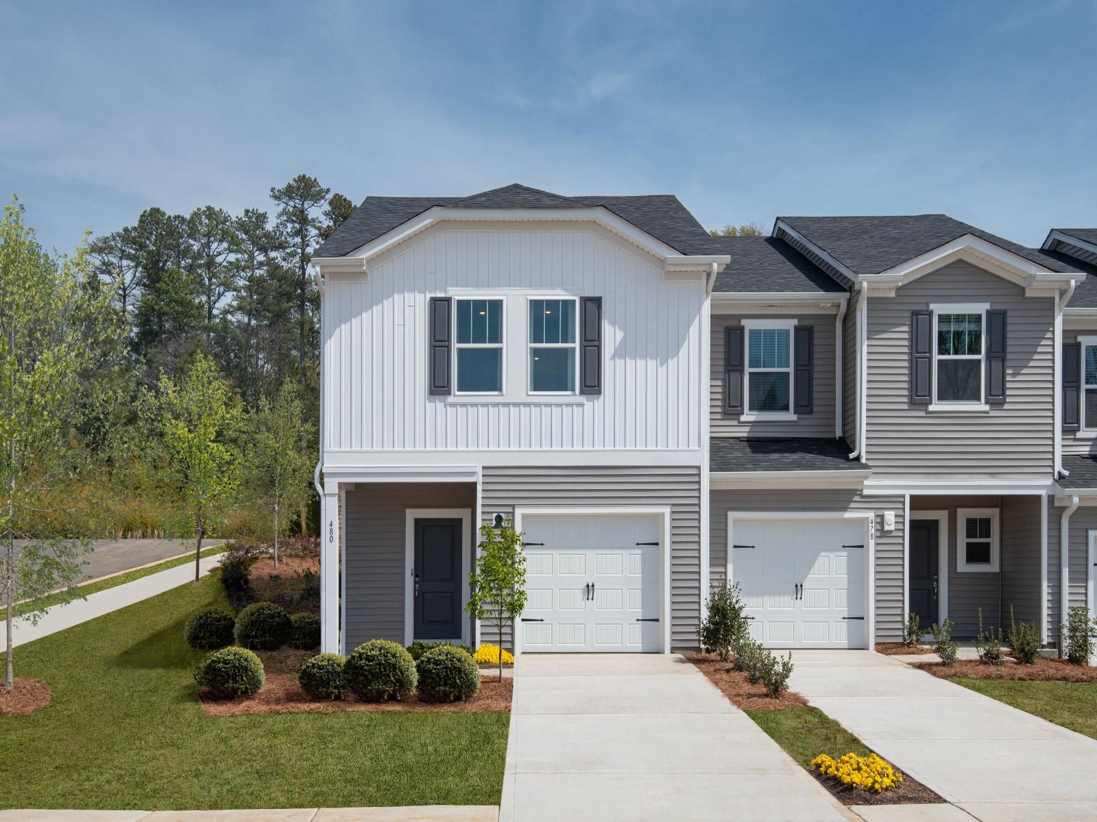 Front Exterior:Welcome home to the Amber floorplan modeled at Ashe Downs.