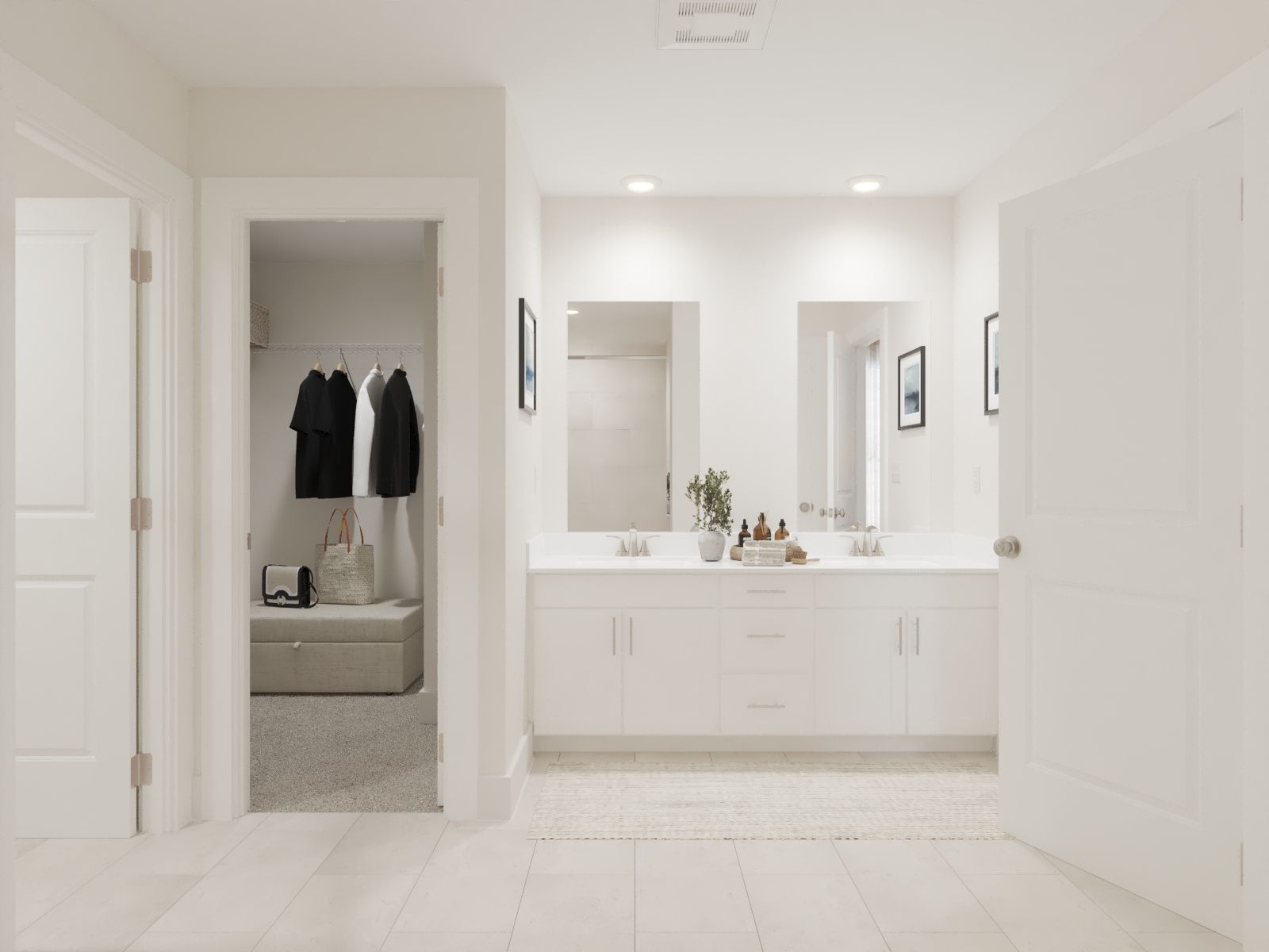 Primary Bathroom:The primary bathroom offers dual vanity sinks and a walk-in shower.