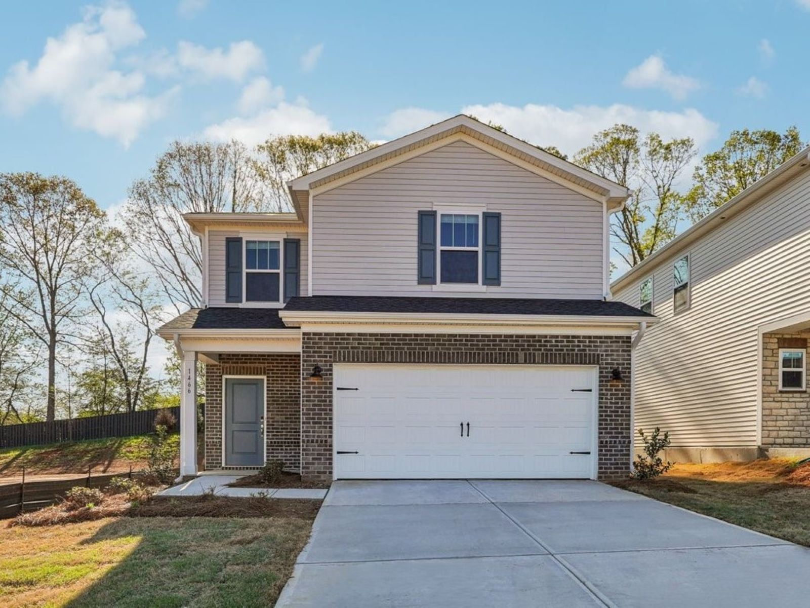 Front Exterior:Welcome to the Finley floorplan at a Meritage Homes community in Charlotte, NC.