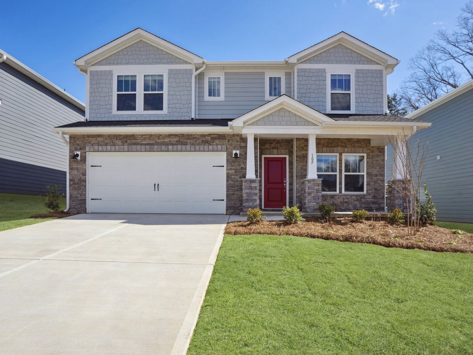 Front Exterior:Welcome to the Johnson floorplan at a Meritage Homes community in Charlotte, NC.