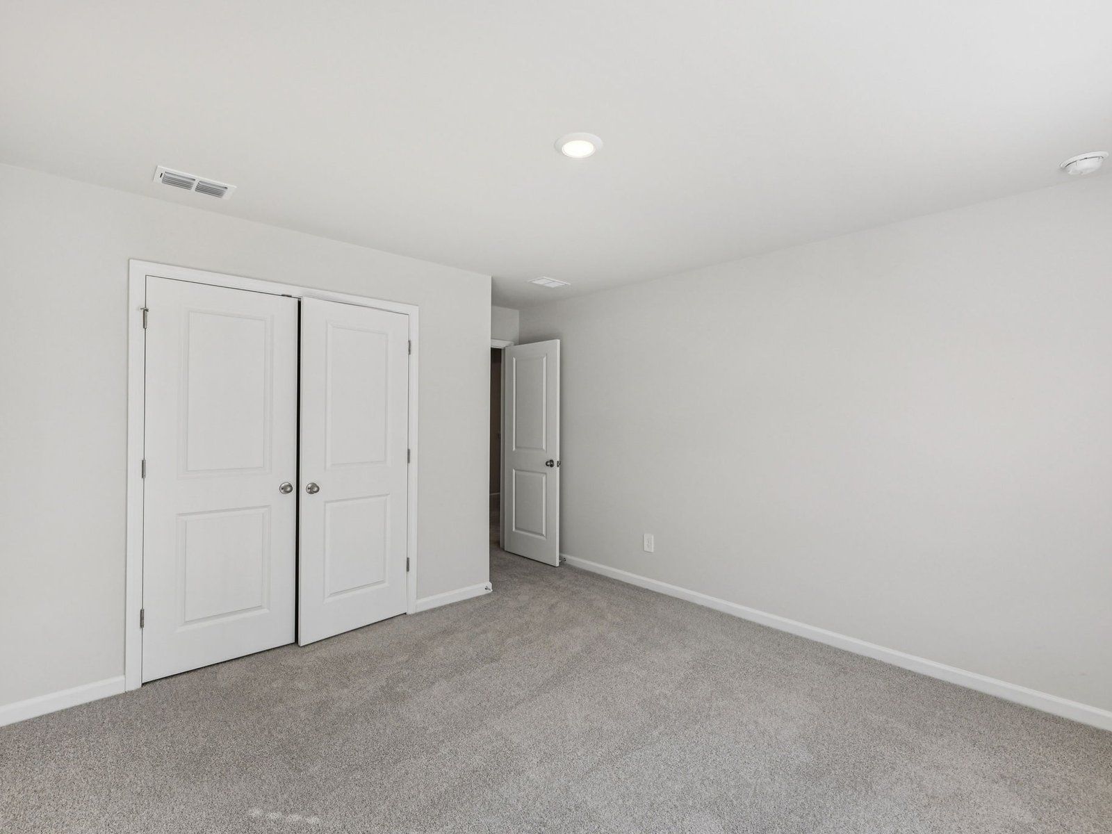 The Taylorsville floorplan with the Elemental White interior package.:Secondary Bedroom