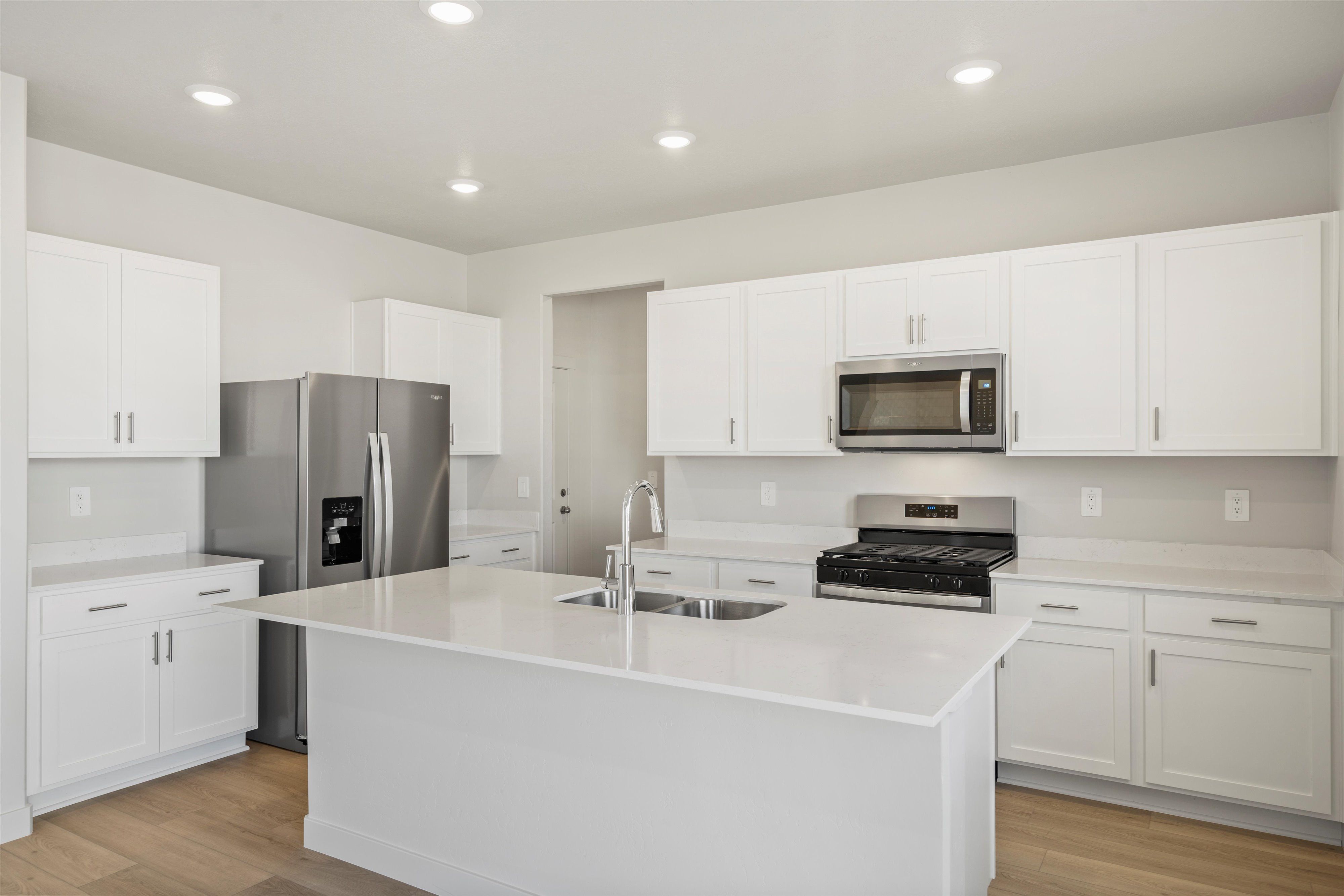 Kitchen:The Aspen floorplan interior image taken at a Meritage Homes community in Santaquin, UT.