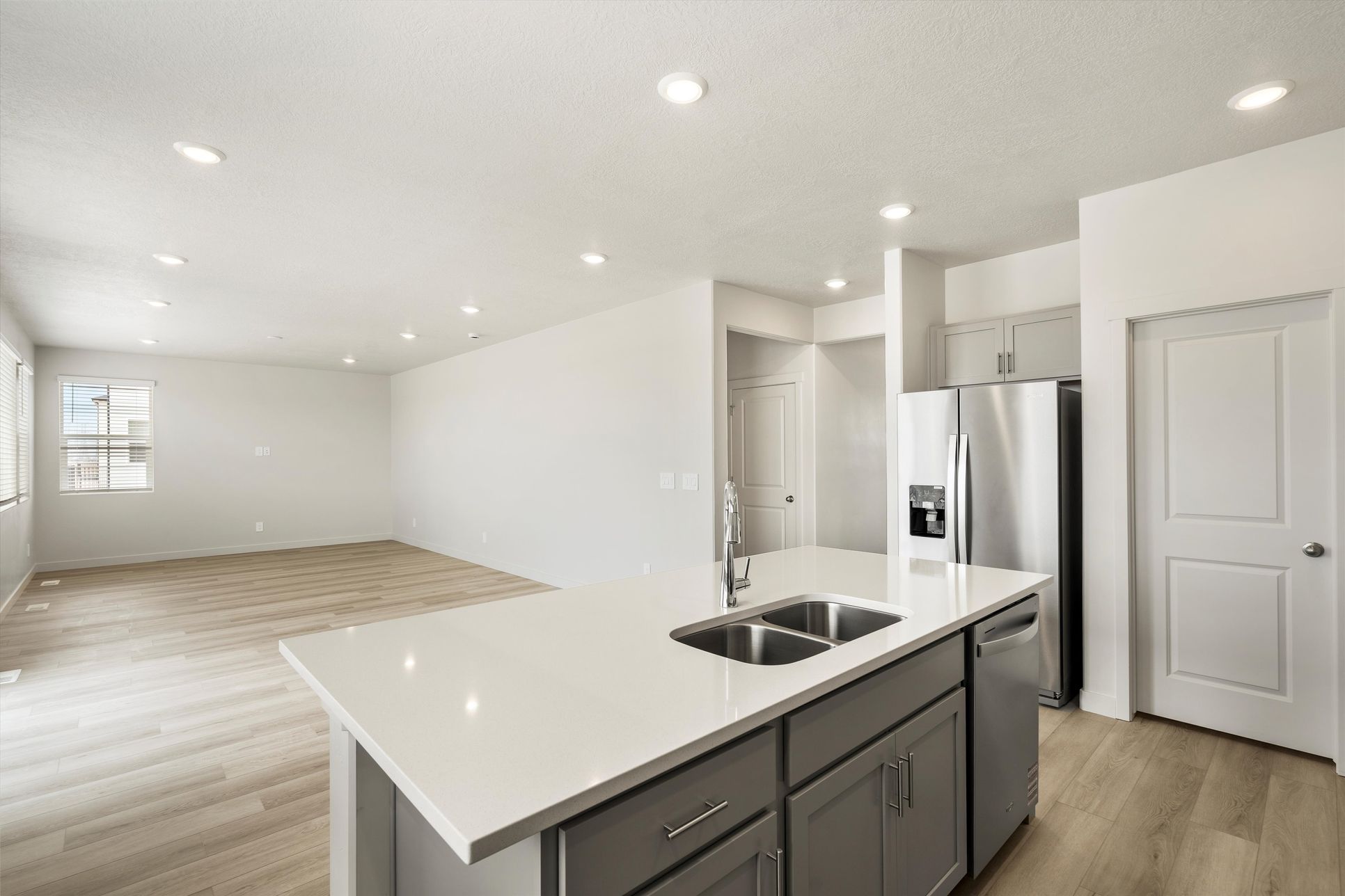 The Residence 4 floorplan interior image taken at a Meritage Homes Community in West Haven, UT.:SLC_Westwood-Residence-4_4211_Living-Area_C_3545-S-3150-W-St-West-Haven-UT.jpg