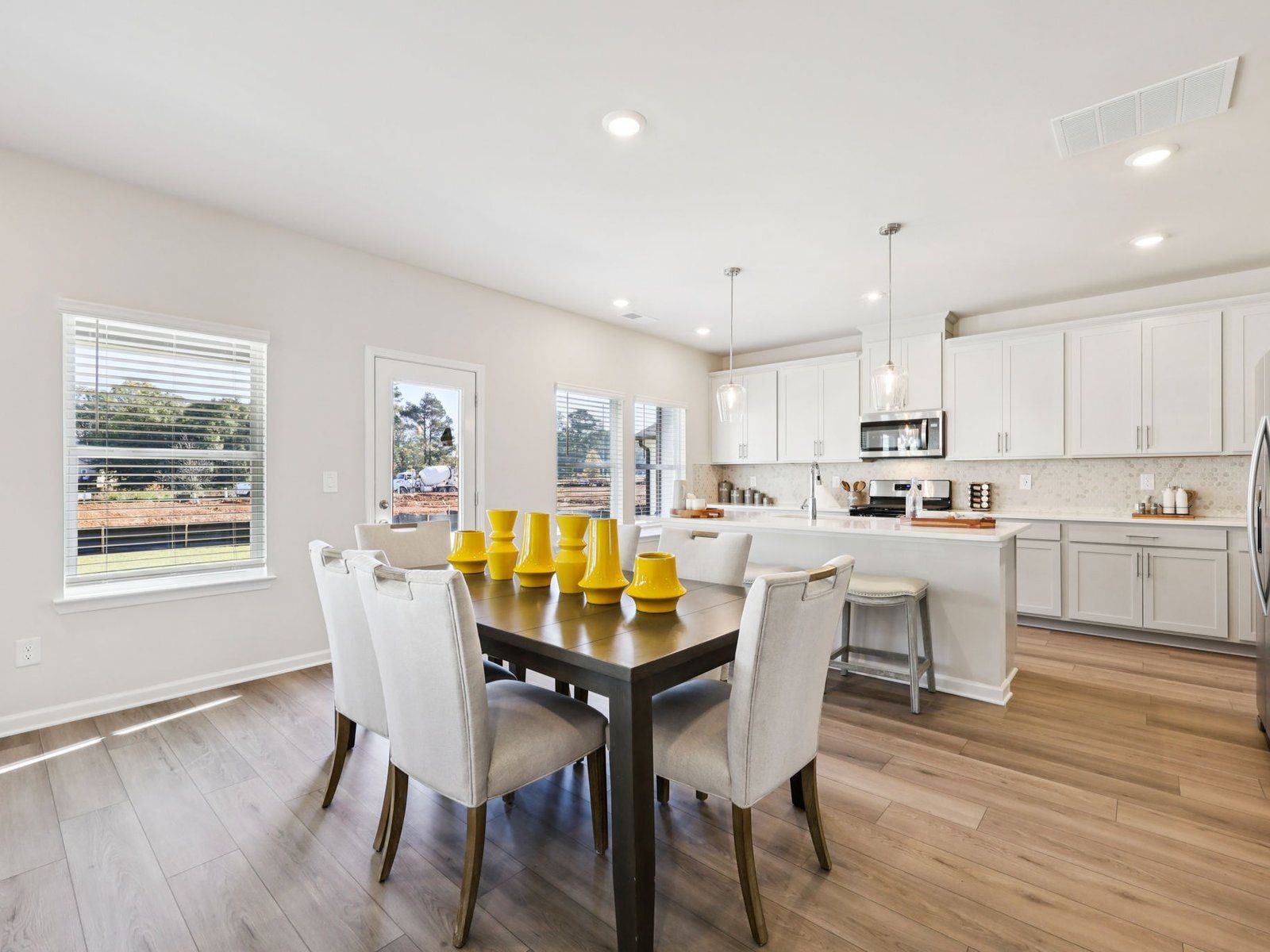 The Dakota floorplan with the Elemental Frost interior package.:Dining Room