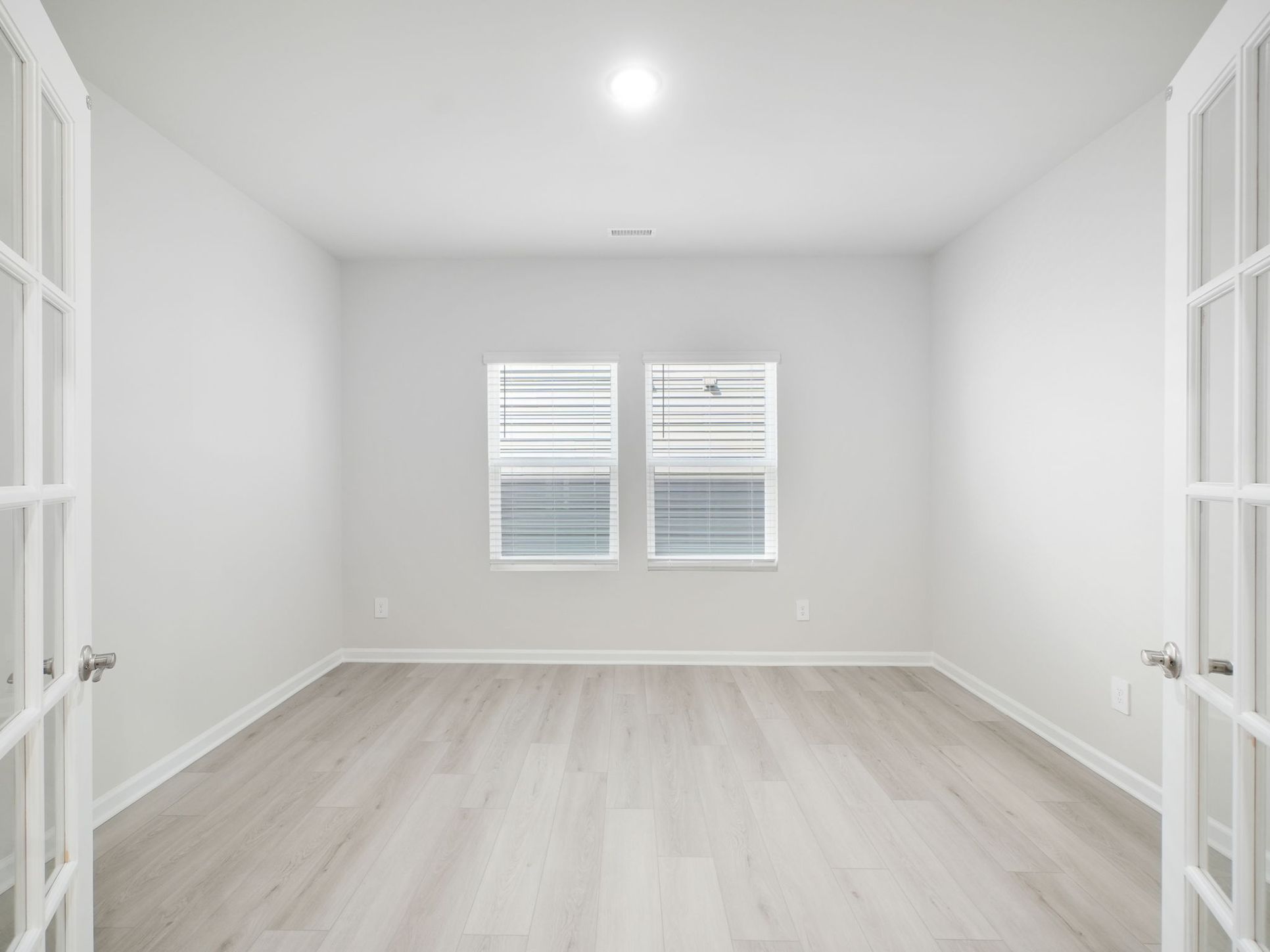 Study in the Taylorsville floorplan at a Meritage Homes community in Garner, NC.:Study