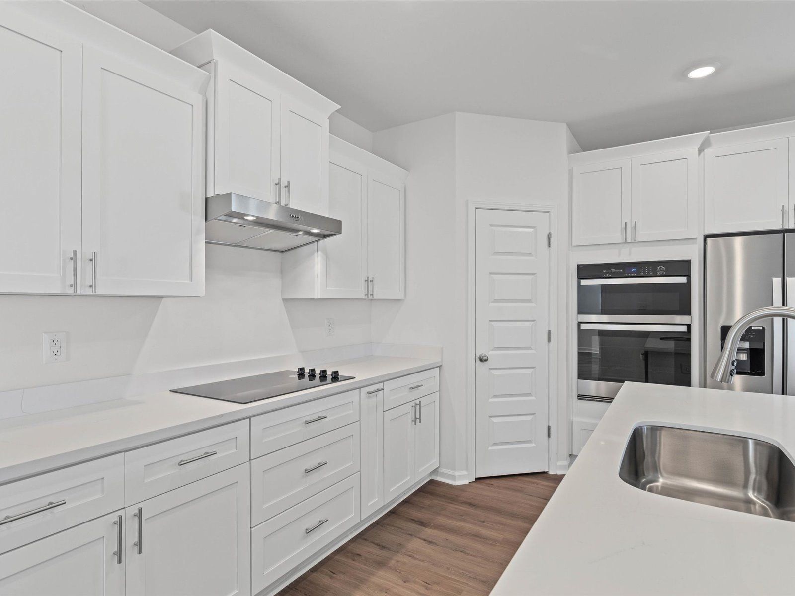 Kitchen in the Claiborne floorplan at a Meritage Homes community in Ocean Springs, MS.:Kitchen