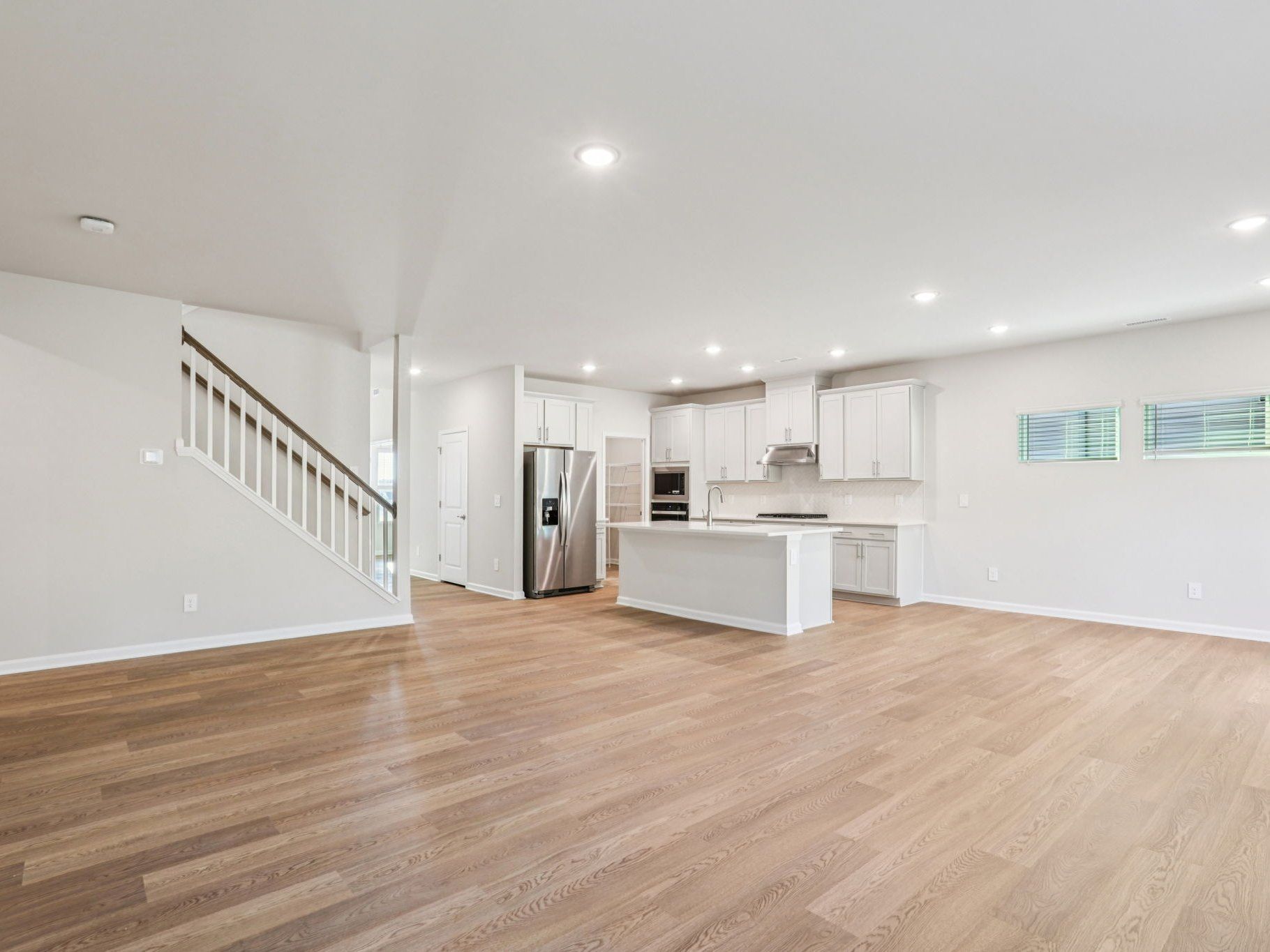 Great Room:Great room in the Johnson floorplan at a Meritage Homes community in Garner, NC.