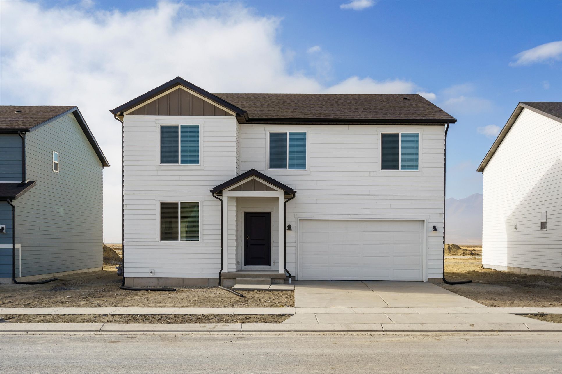 The Aspen floorplan exterior image taken at a Meritage Homes community in Eagle Mountain, UT.:SLC_Aspen_#4251_Front-Exterior_A_3491-N-Browning-St-Eagle-Mountain-UT.jpg