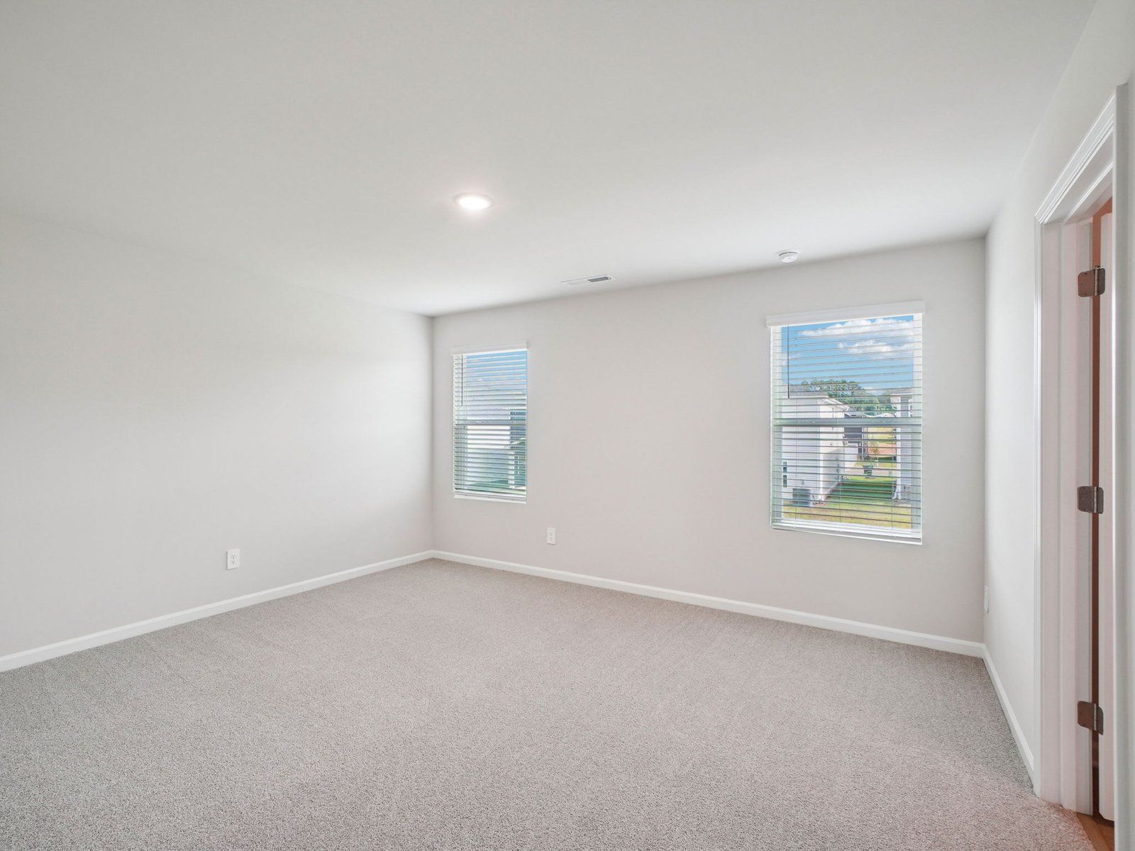 Primary Bedroom:Primary bedroom in the Paisley floorplan at a Meritage Homes community in Garner, NC.