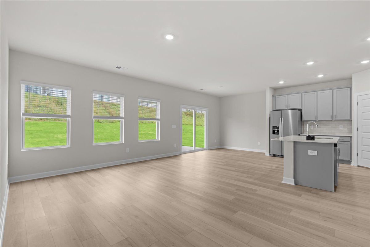 Welcome to the Chatham floorplan at The Farm at Wells Creek - Signature Collection.:Living Room