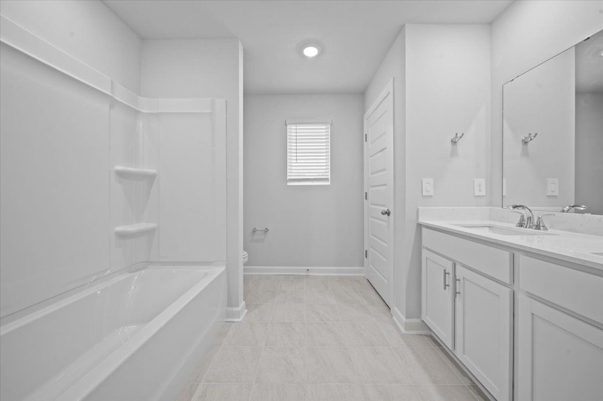 Bathroom:Welcome to the Johnson floorplan at The Farm at Wells Creek - Signature Collection.