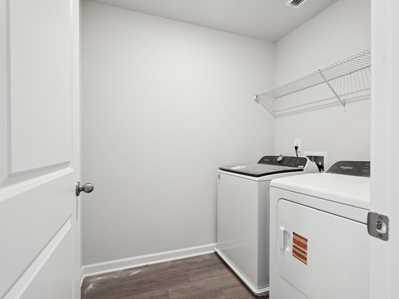 ATL_OaksatDawson_S447Brentwood_LaundryRoom_94SequoiaLane:The Brentwood floorplan with the Elemental White Interior Package.