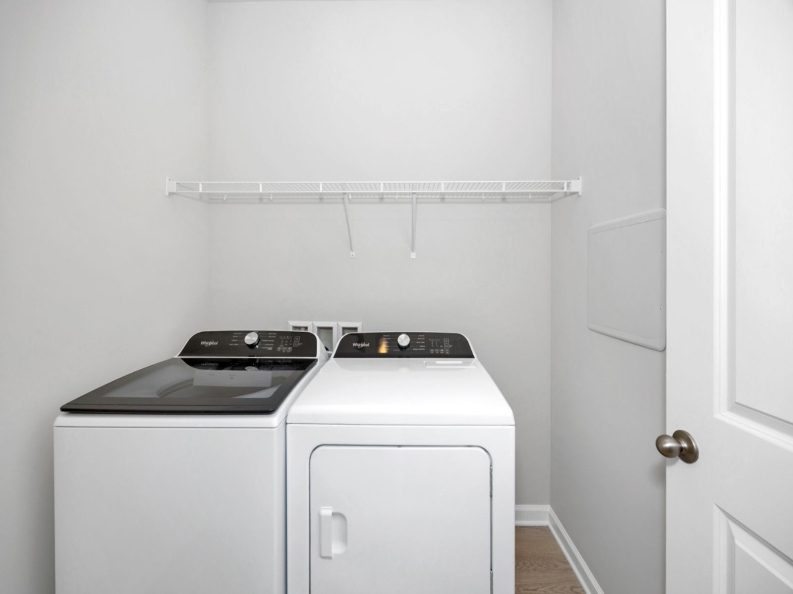 The Carolina floorplan with the Lush White interior package.:Laundry Room