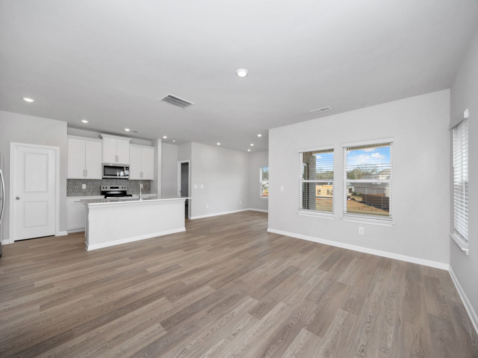 Great Room:The Carolina floorplan with the Lush White interior package.
