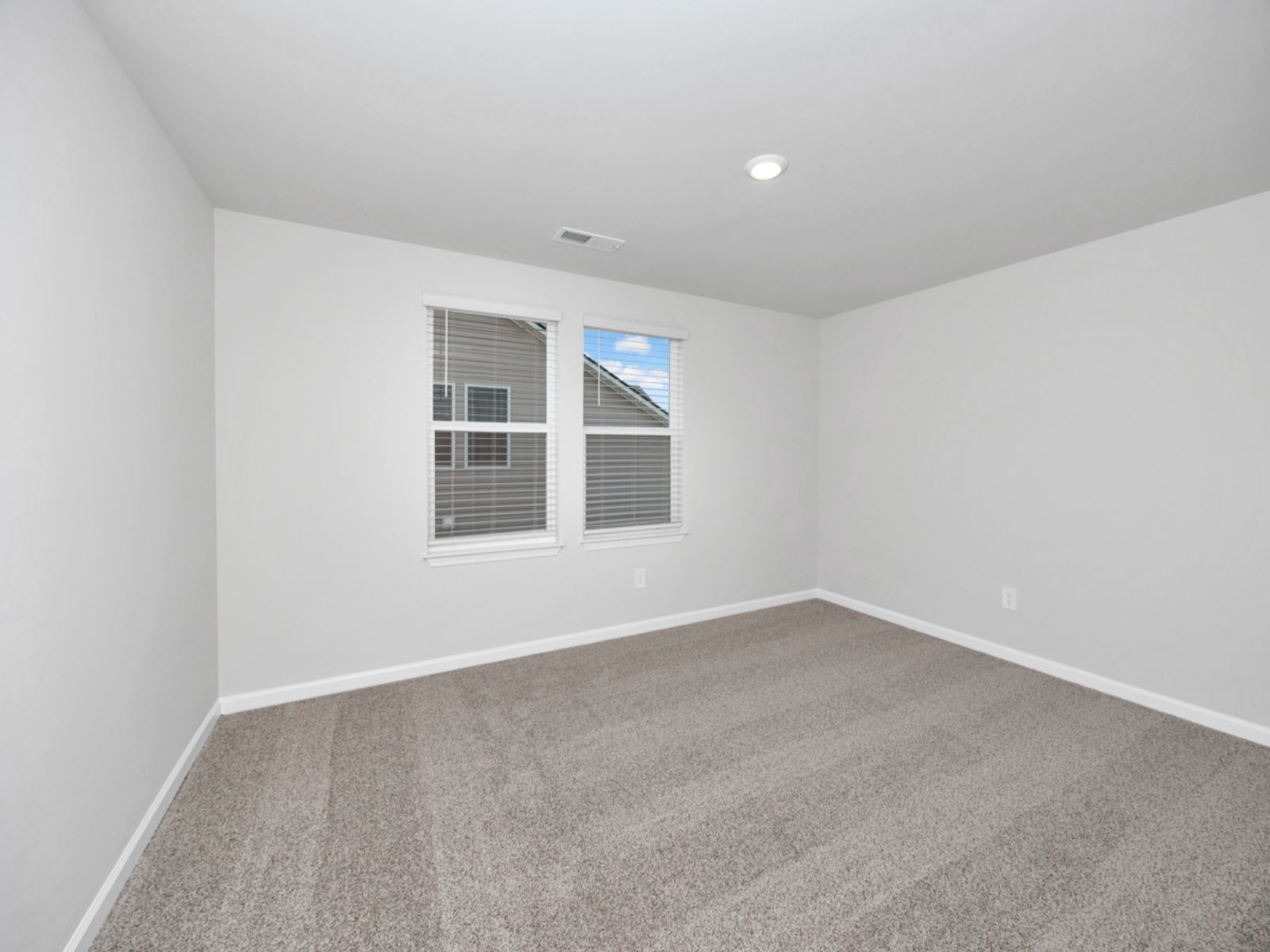 The Carolina floorplan with the Crisp White interior package.:Secondary Bedroom