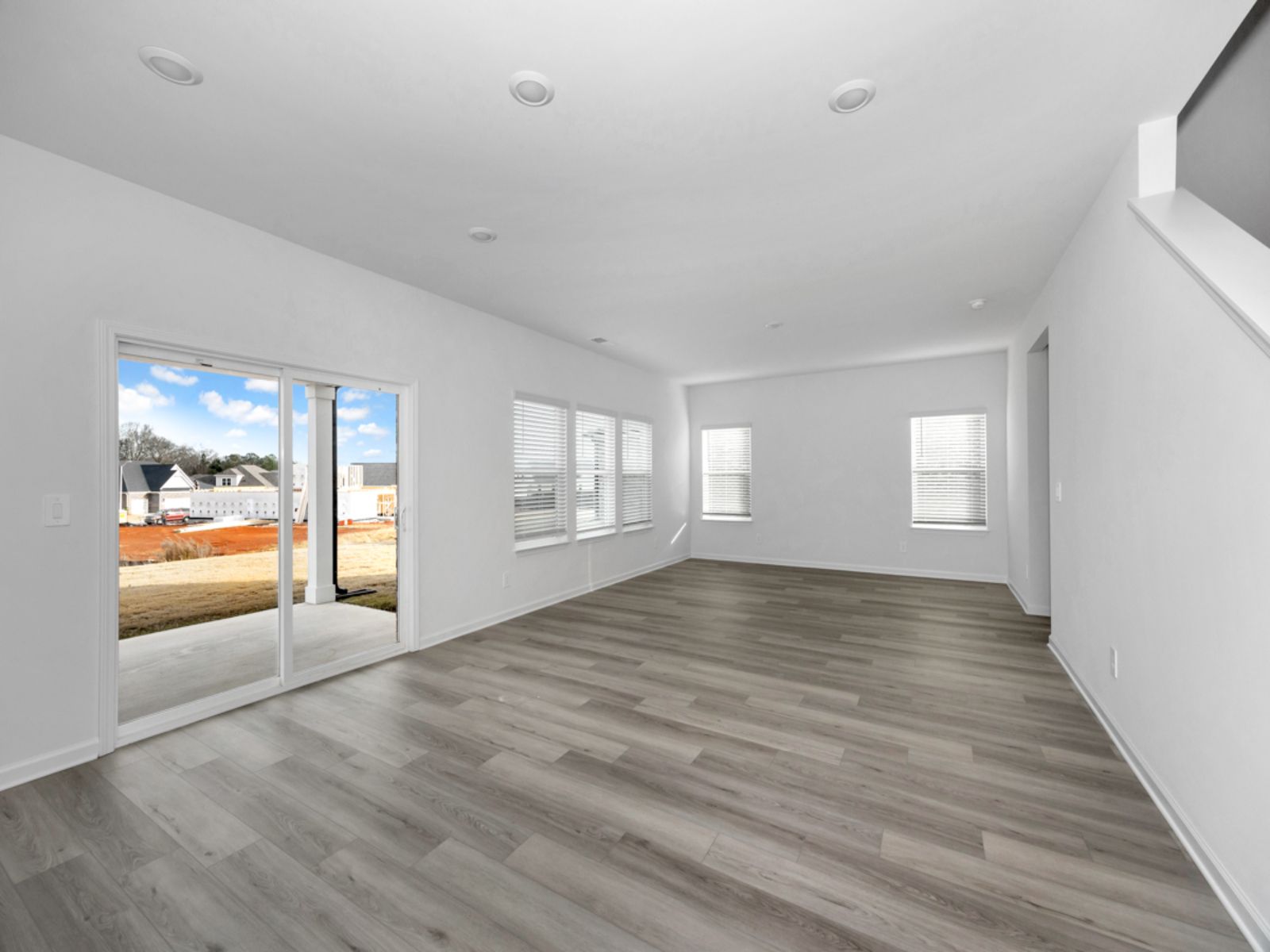 The Dakota floorplan with the Balanced White interior package.:Great Room