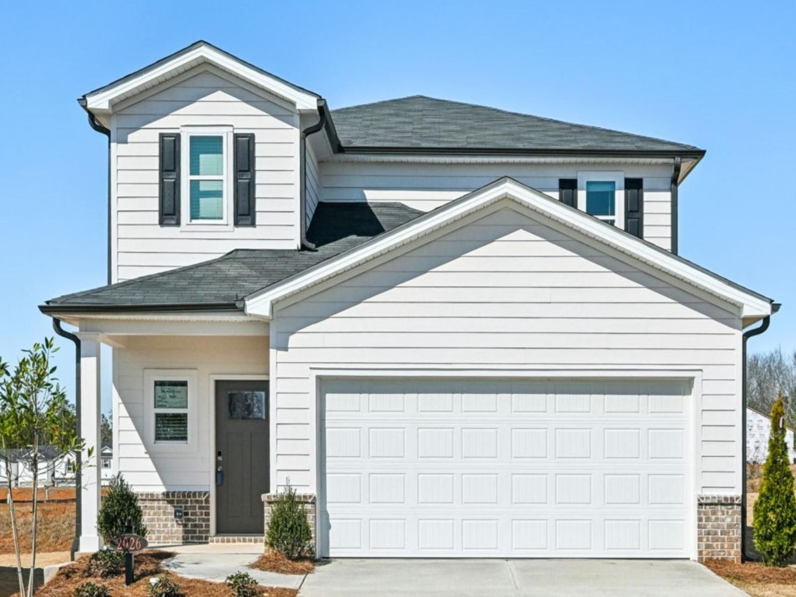Front Exterior:The Sydney floorplan with Elevation C modeled at Martin Springs.