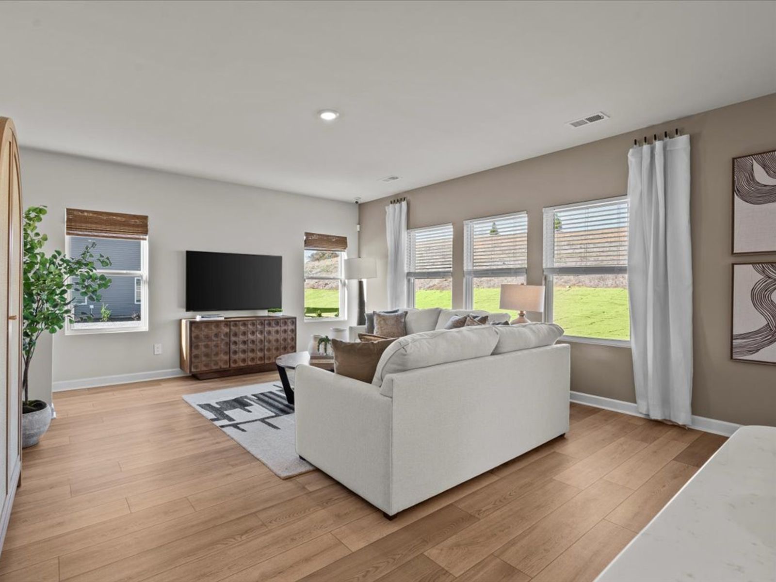 Great Room:Great room in the Brentwood floorplan at a Meritage Homes community in Greenville, SC.