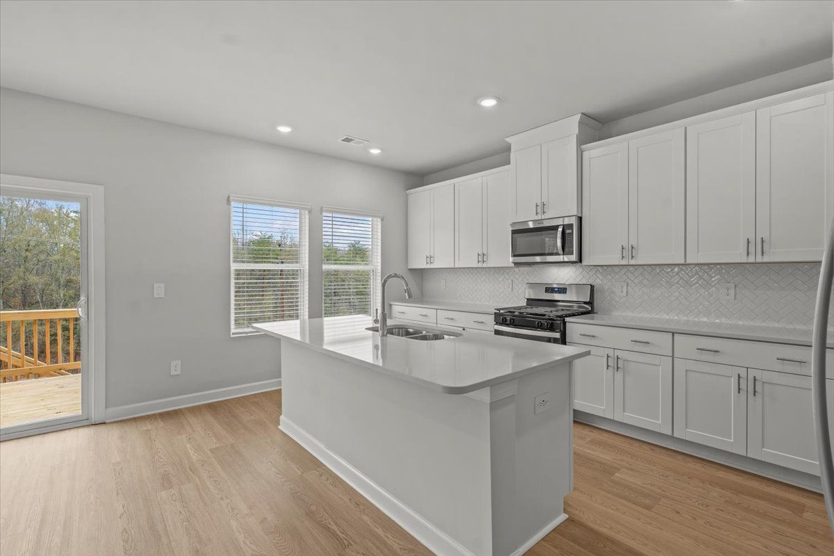 Kitchen:Welcome to the Dakota floorplan at Chatham Forest.
