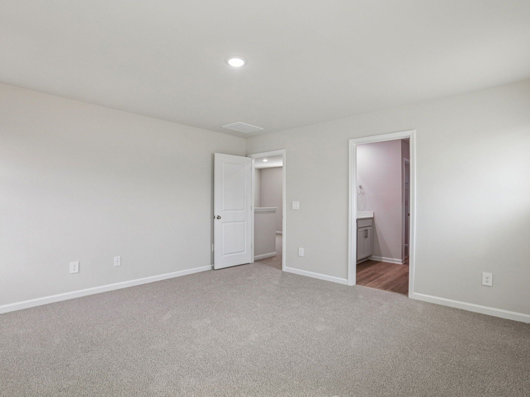 Primary Bedroom:Primary bedroom in the Dallas floorplan at a Meritage Homes community in Garner, NC.