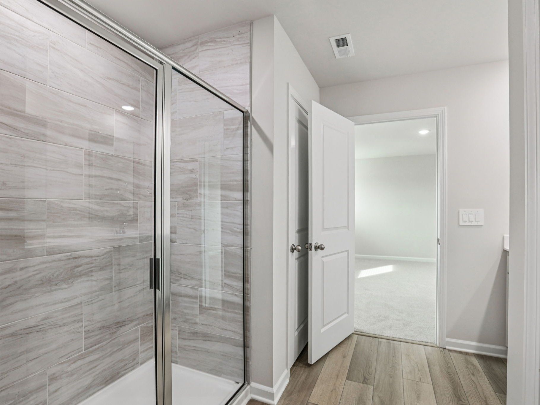 Primary Bathroom:Primary bathroom in the Dallas floorplan at a Meritage Homes community in Garner, NC.