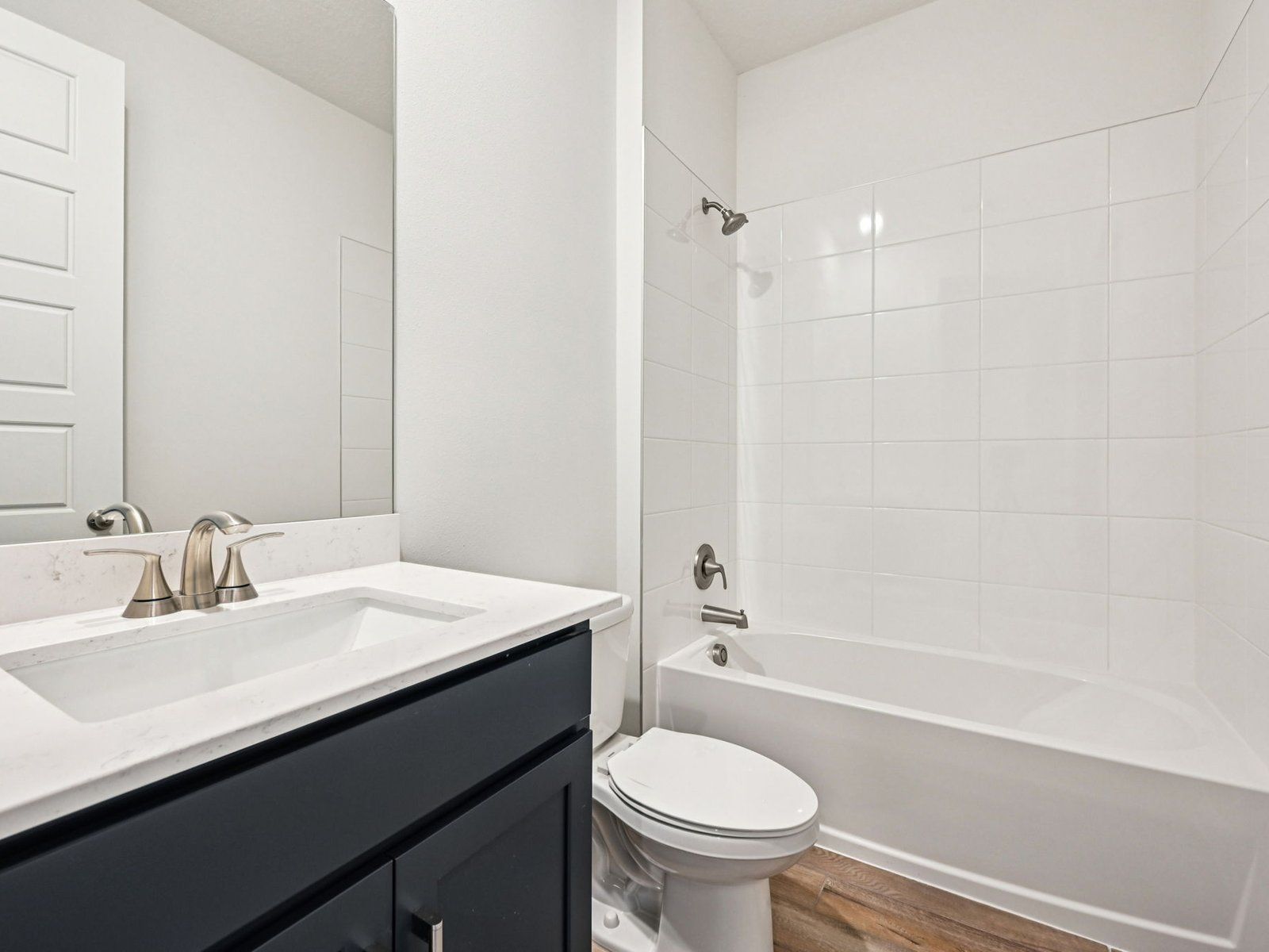 Secondary bathroom:The Coral floorplan at 5629 Hampton Park Cir.