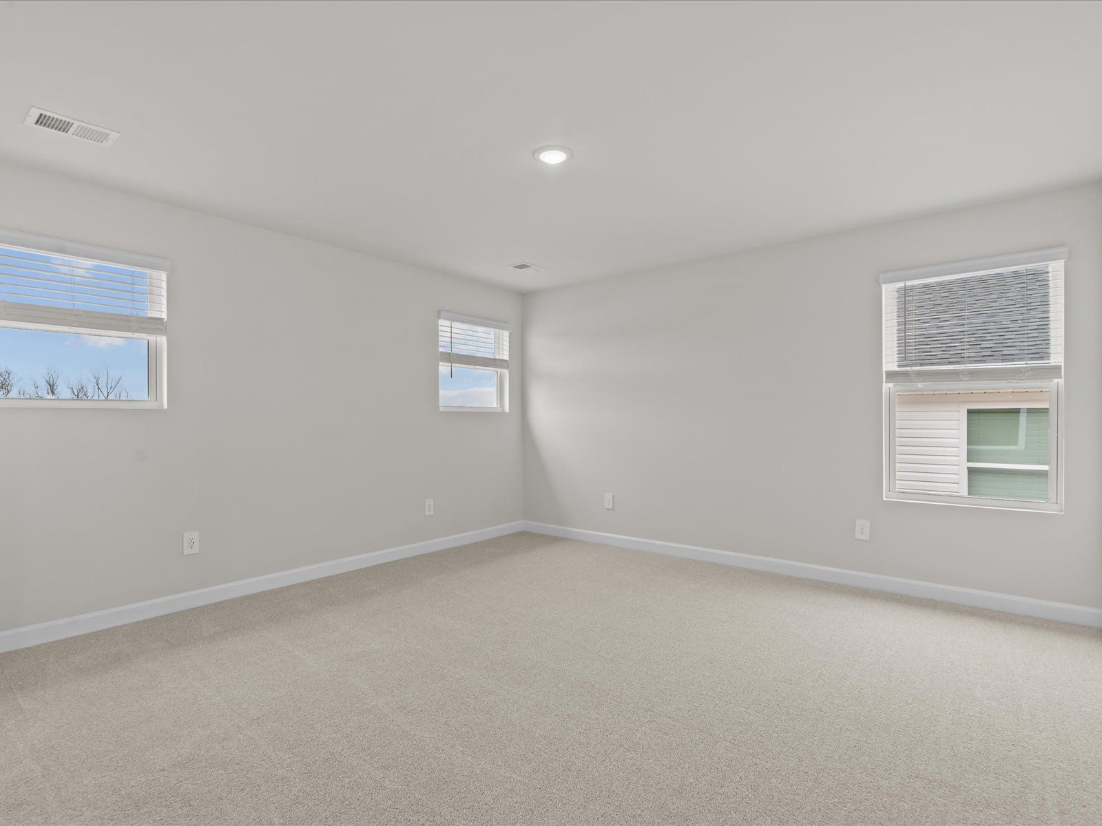 Primary Bedroom:The Dallas floorplan modeled at Farm at Wells Creek.