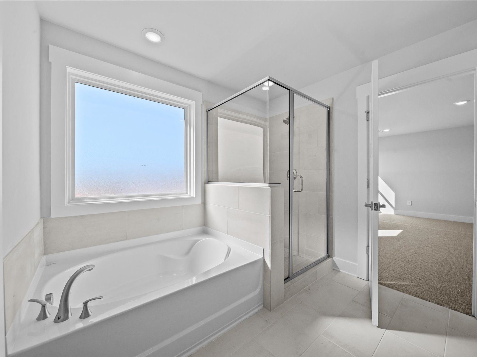 Primary Bathroom:The Johnson floorplan modeled at Riverwood Farm.