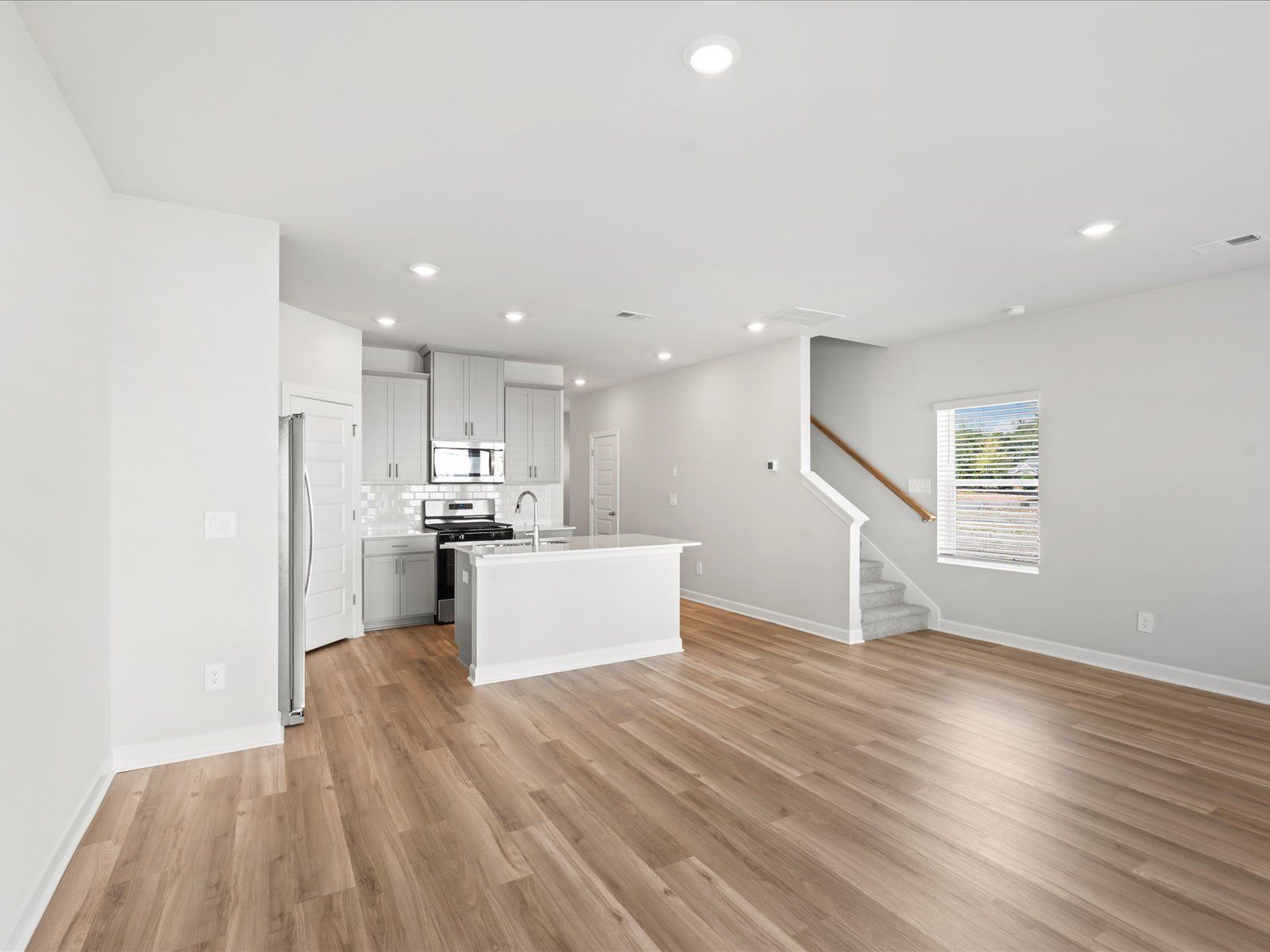 Great Room:The Amber floorplan modeled at Valentine Townes.