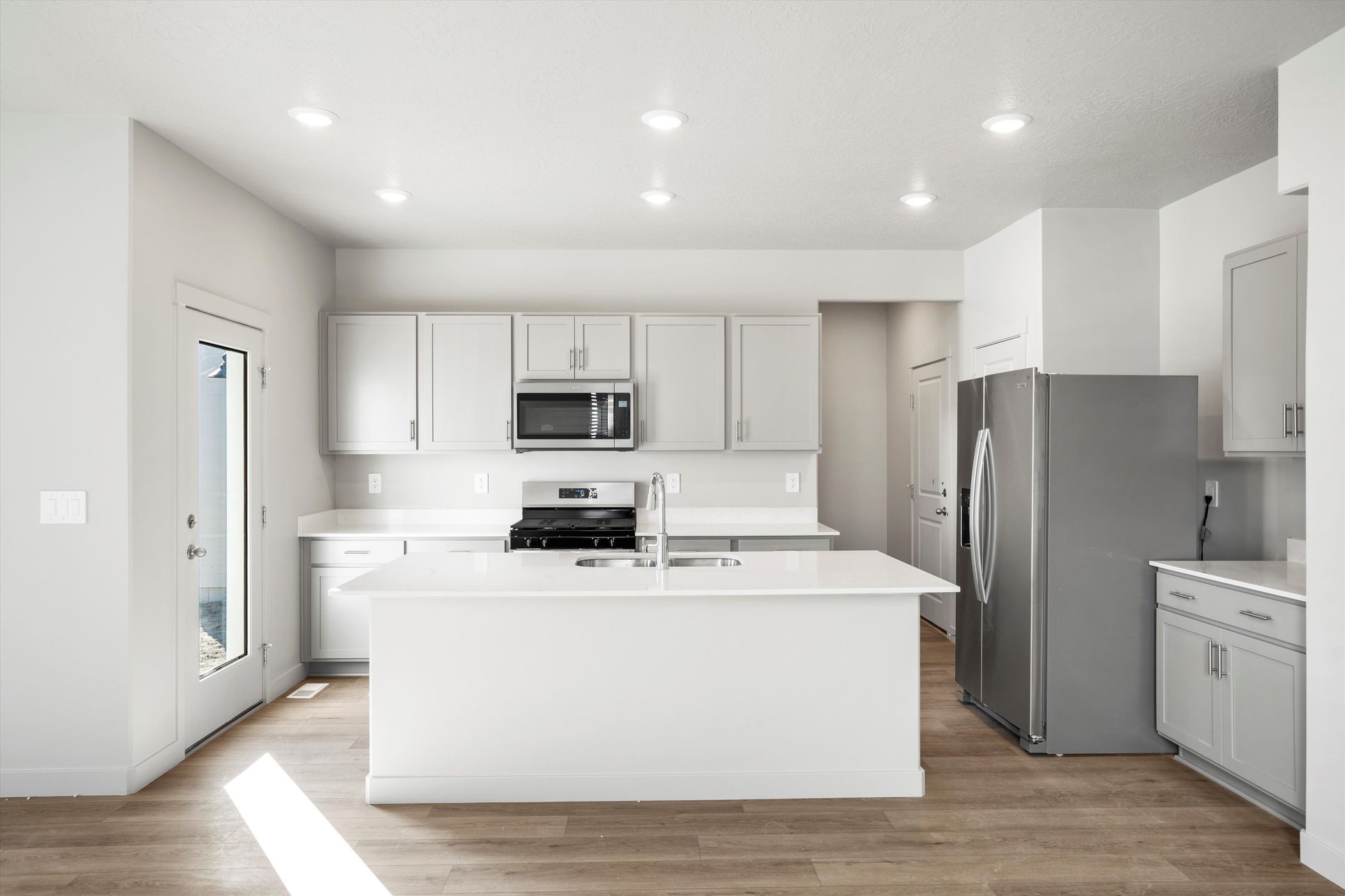Kitchen:The Sunset floorplan interior image taken at a Meritage Homes community in Eagle Mountain, UT.