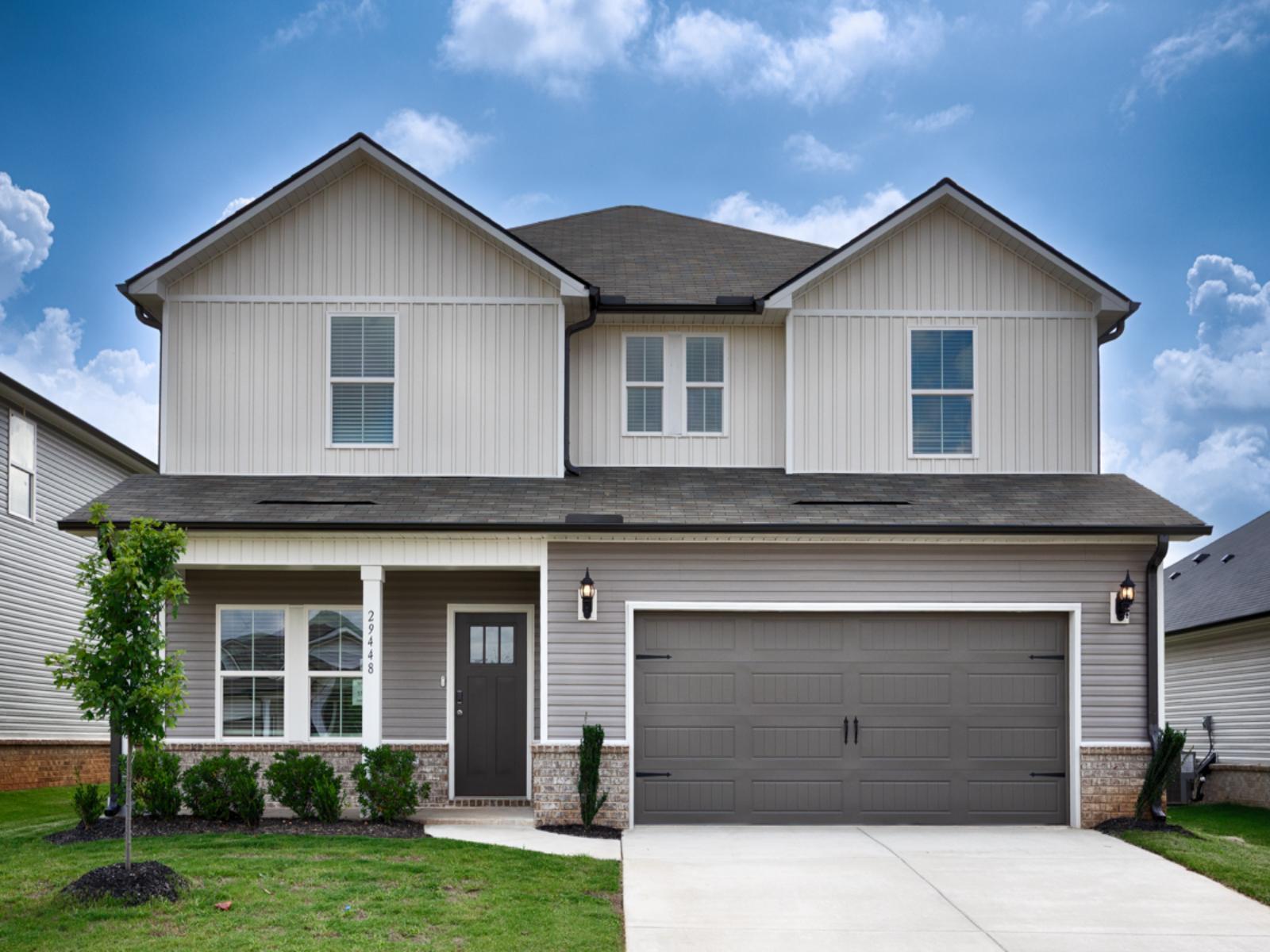 Front Exterior:The Dakota floorplan with Elevation F modeled at Madison Preserve.