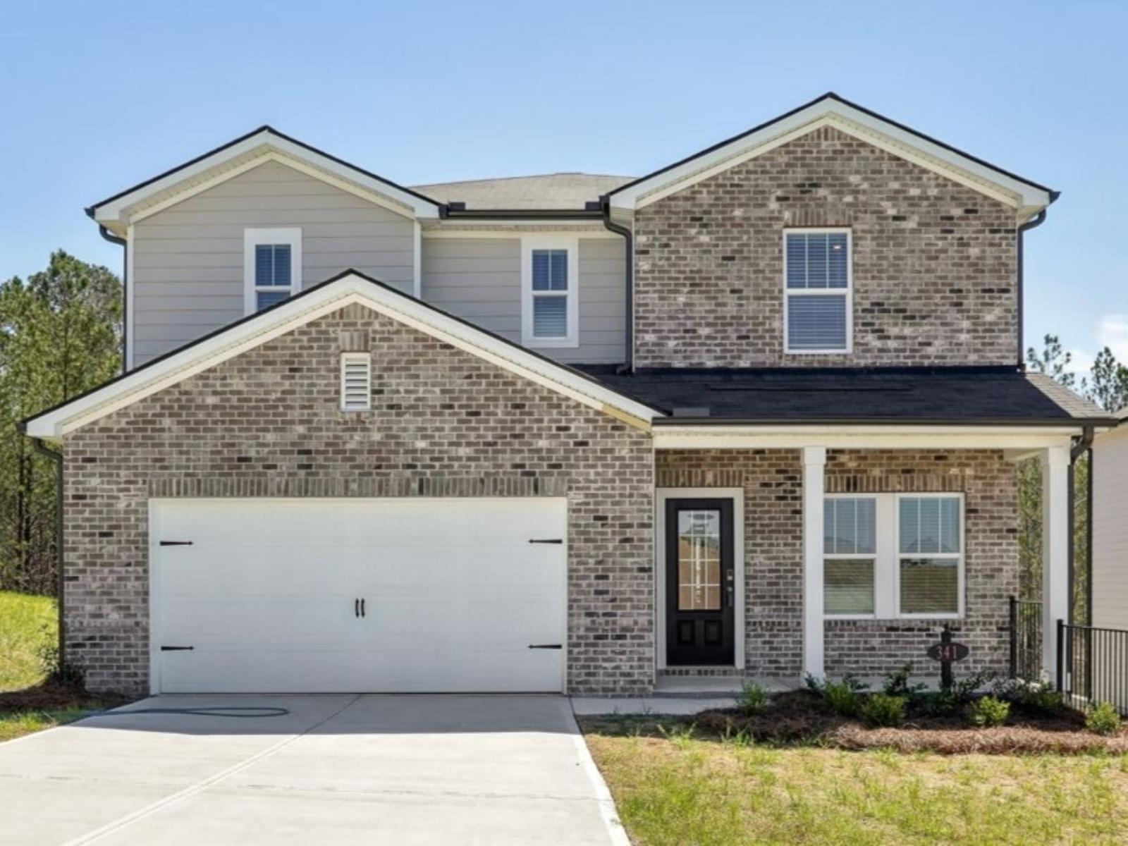 Front Exterior:The Dakota floorplan with Elevation D modeled at Ivey Township.