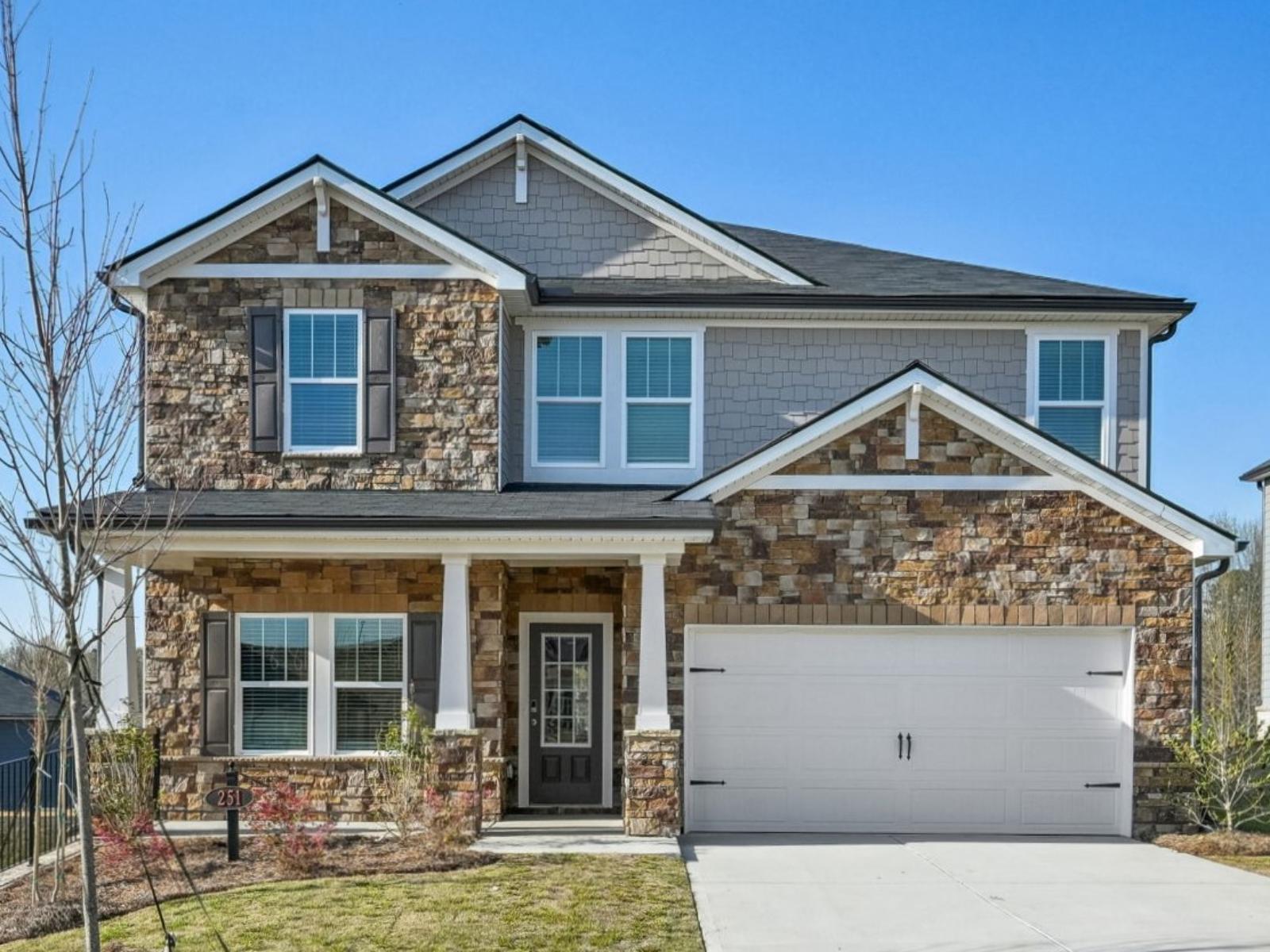 Front Exterior:The Chatham Basement floorplan with Elevation K modeled at Vines at Mill Creek.
