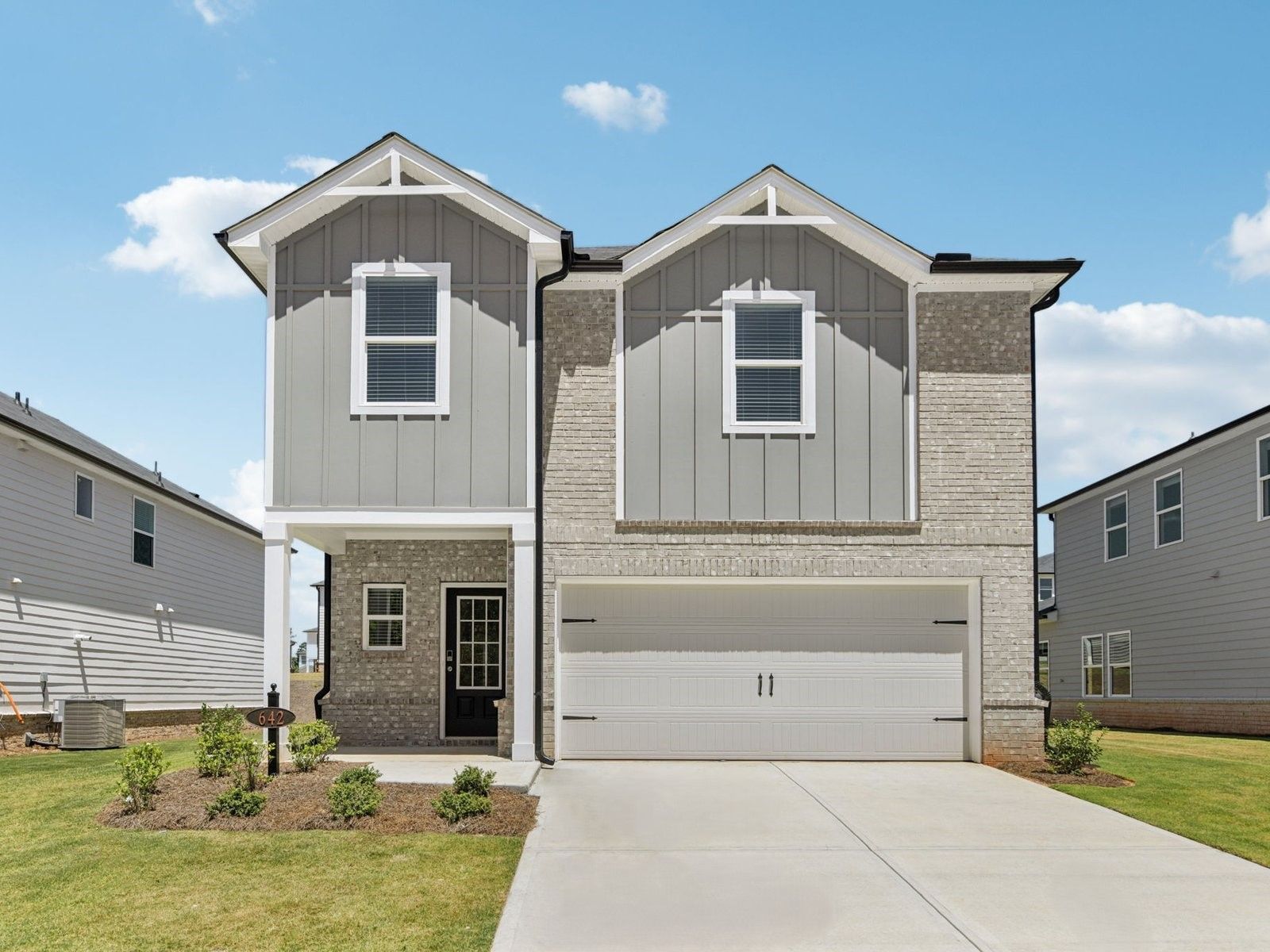 Front Exterior:The Lennon floorplan with Elevation F modeled at Martin Springs.