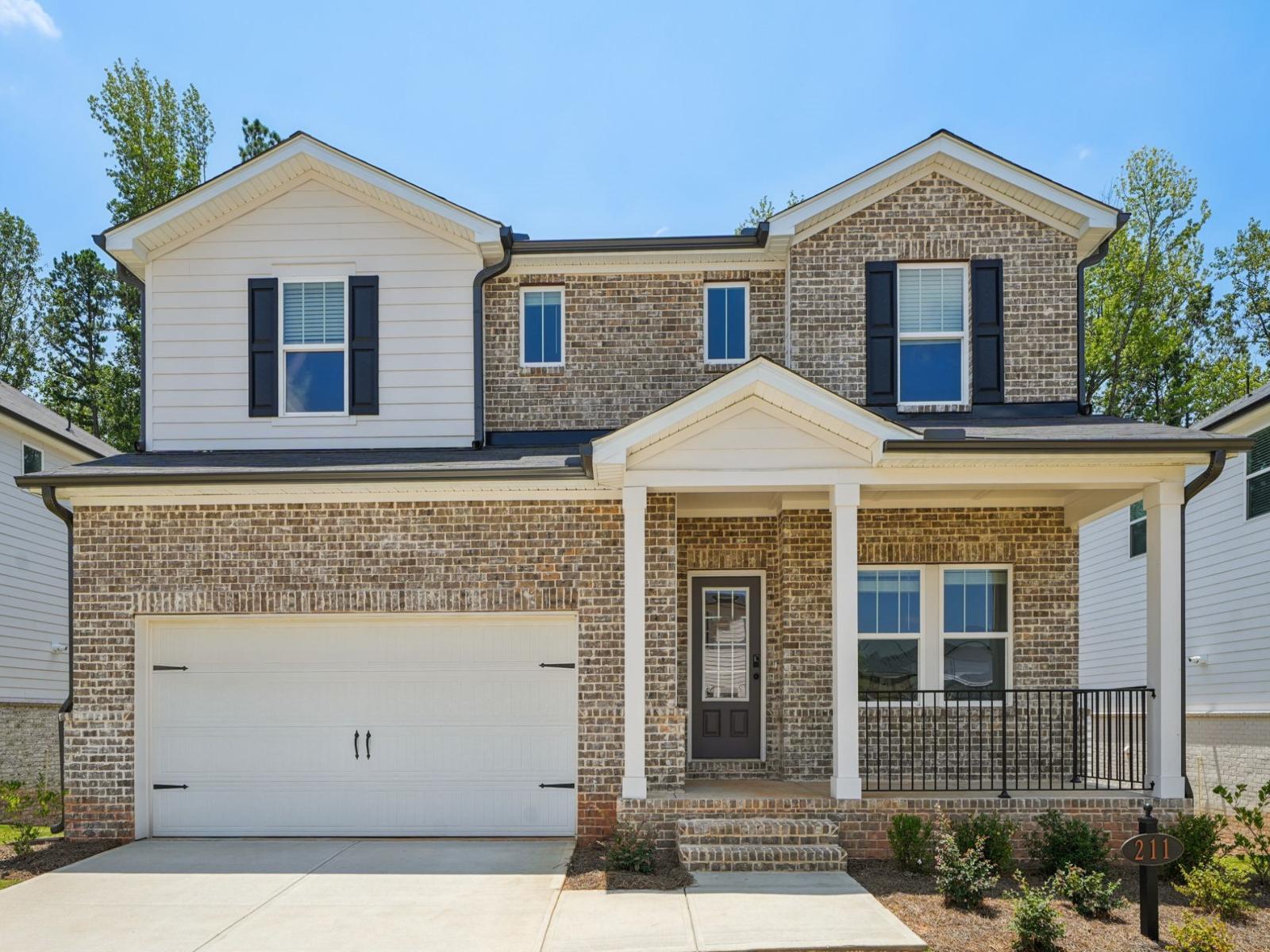 Front Exterior:The Johnson Basement floorplan with Elevation D modeled at Martin Springs..