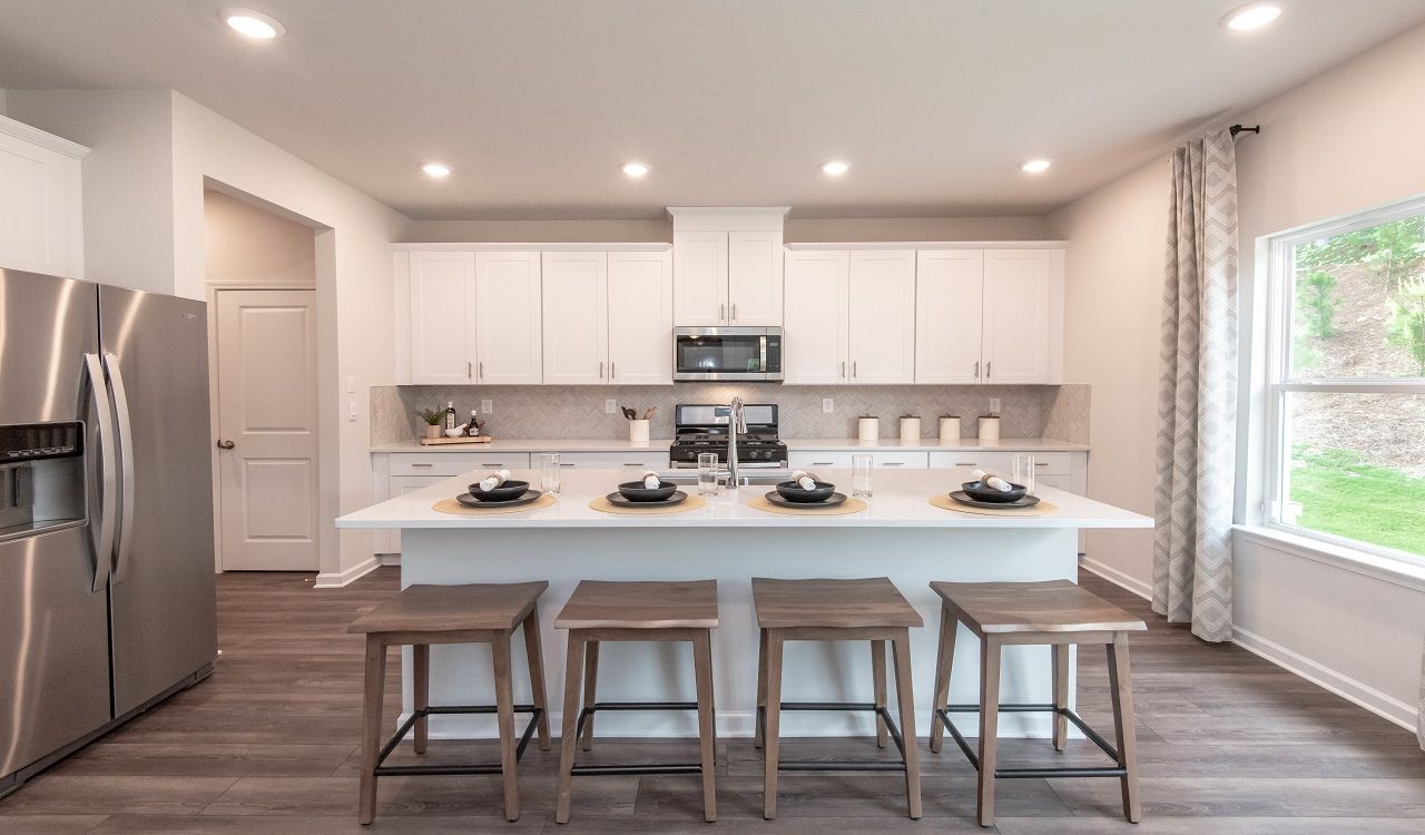 Taylorsville floorplan modeled at Meadows at Bay Creek in Loganville, GA.:Taylorsville floorplan modeled at Meadows at Bay Creek in Loganville, GA.