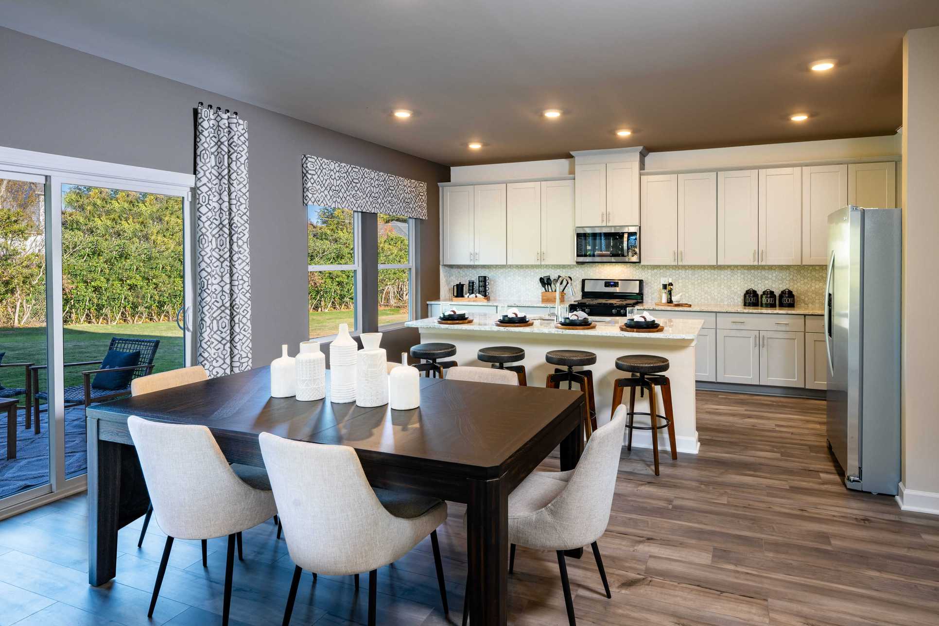 The open-concept floorplan allows for easy entertaining. Photography from Holland Park.:The open-concept floorplan allows for easy entertaining. Photography from Holland Park.