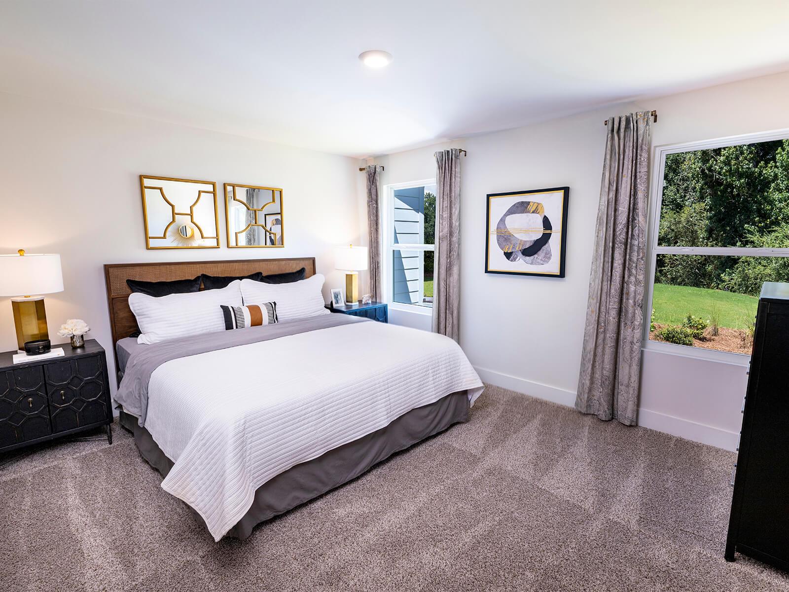 Your primary suite features a luxurious walk-in closet. Photography from City Station Townes.:Your primary suite features a luxurious walk-in closet. Photography from City Station Townes.