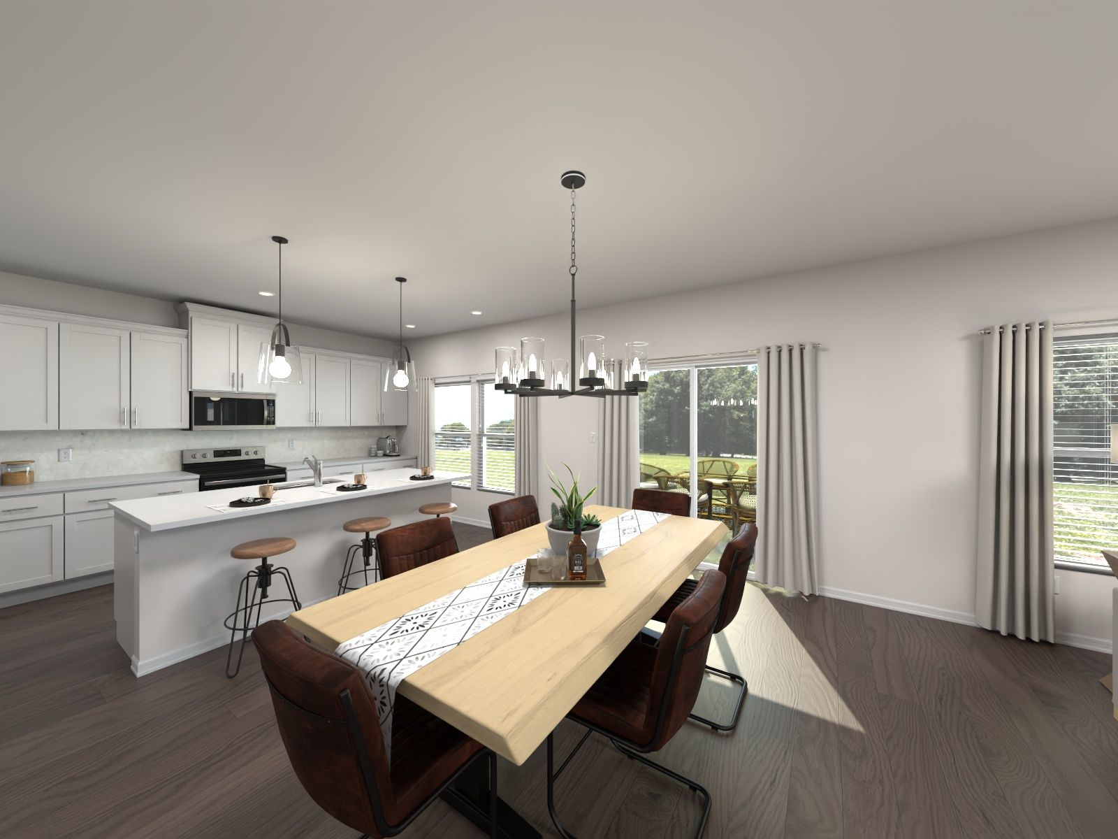 The open-concept floorplan allows for an easy flow between the kitchen and dining areas.:Dining Room