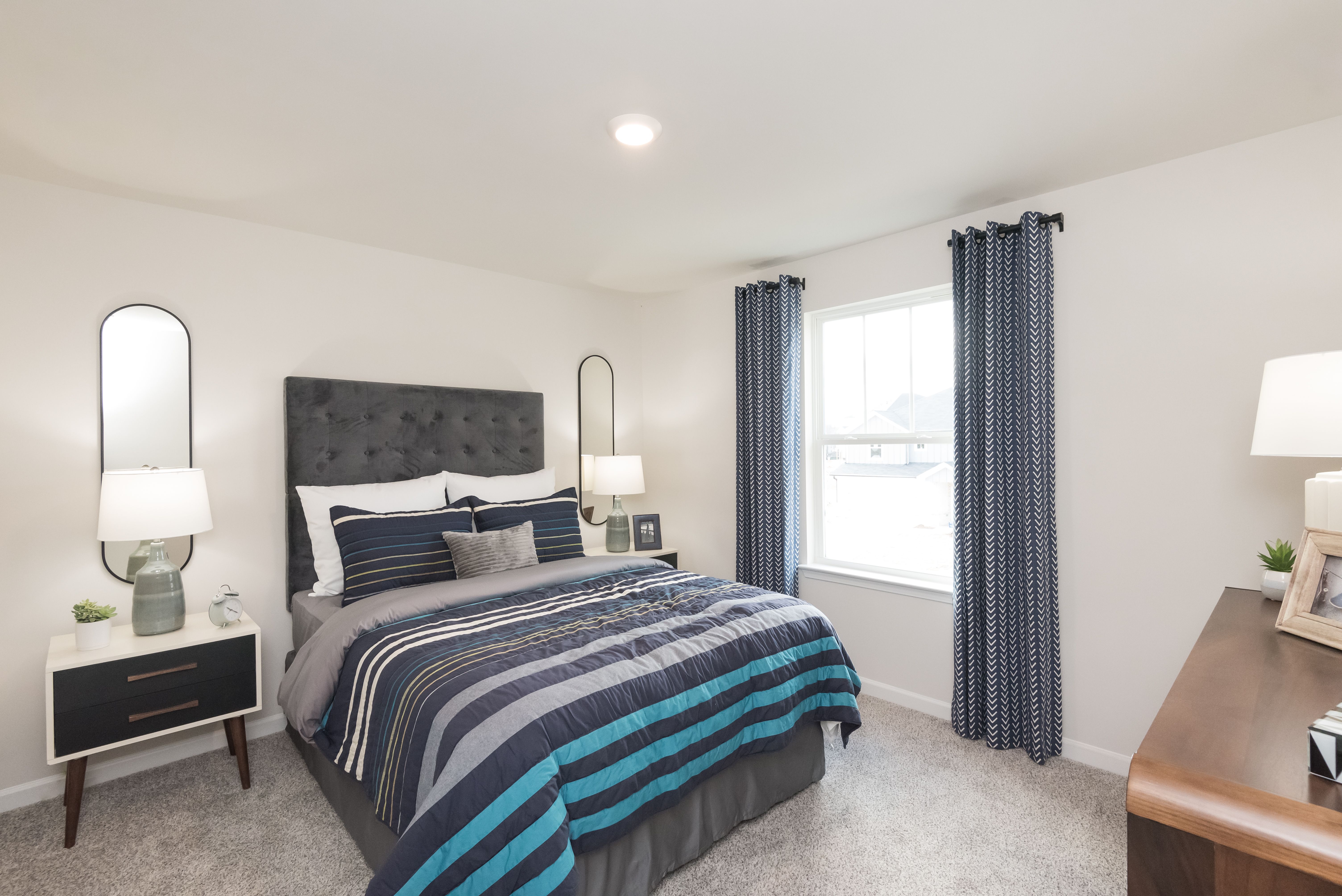 Secondary Bedroom:The Chatham floorplan with the Elemental White interior package modeled at Hamilton Crossing.