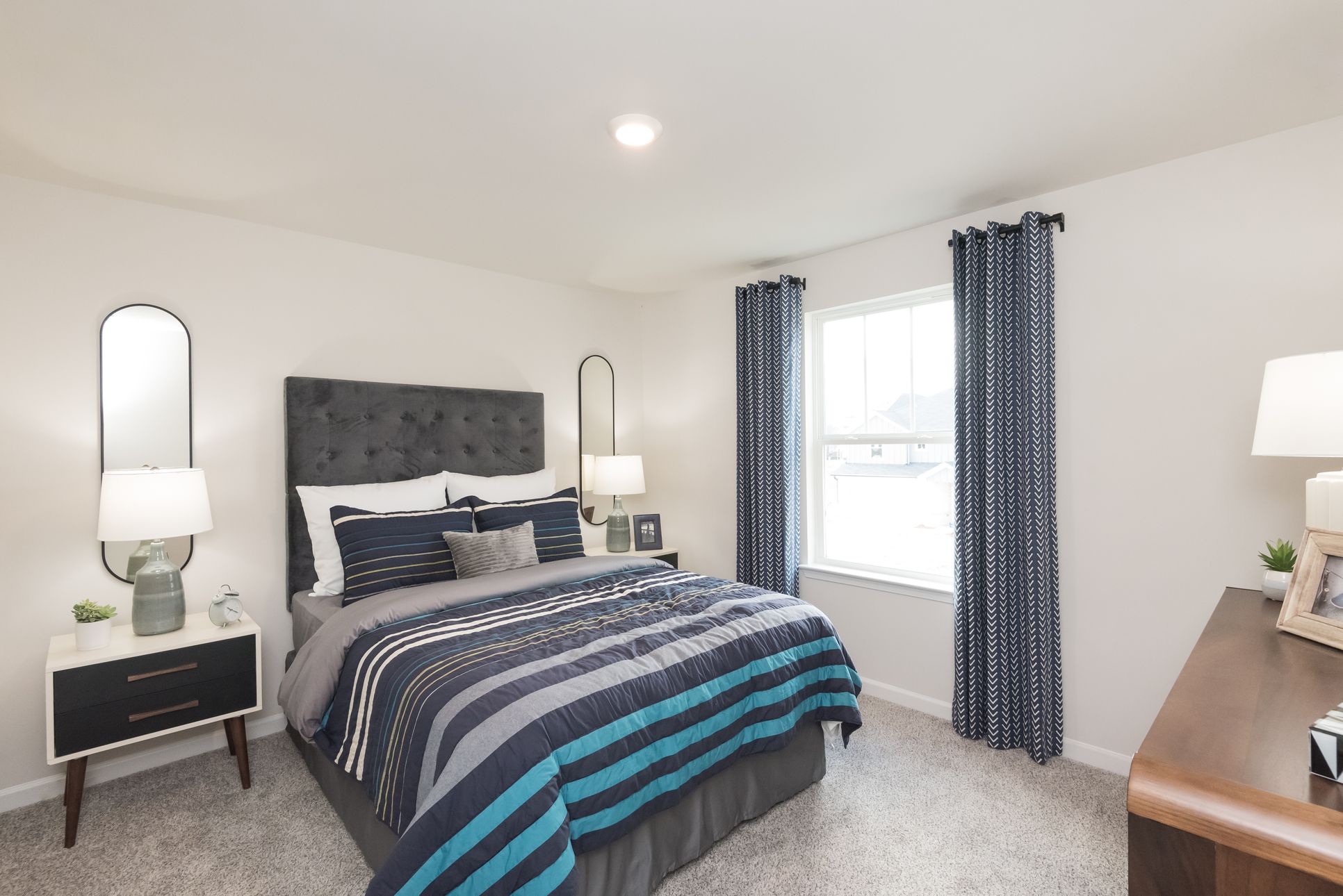 Secondary Bedroom:The Chatham floorplan with the Elemental White interior package modeled at Hamilton Crossing.