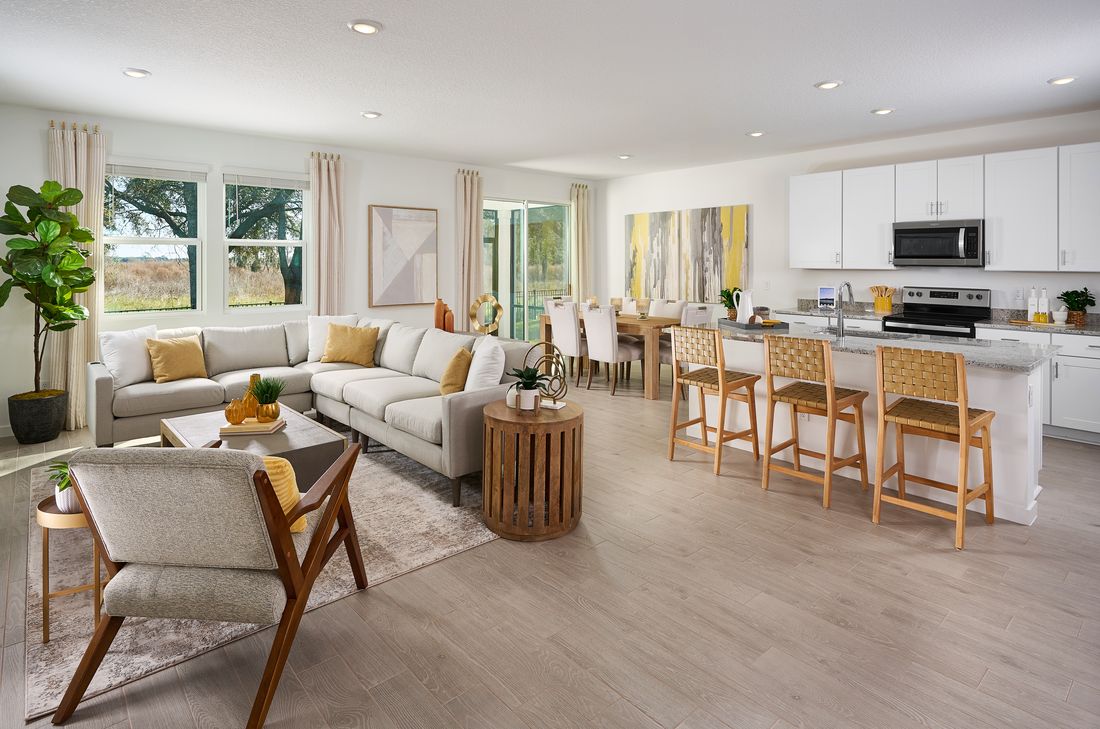 Great room of the Orchid Plan modeled at Lakes at Bella Lago.:Great room of the Orchid Plan modeled at Lakes at Bella Lago.