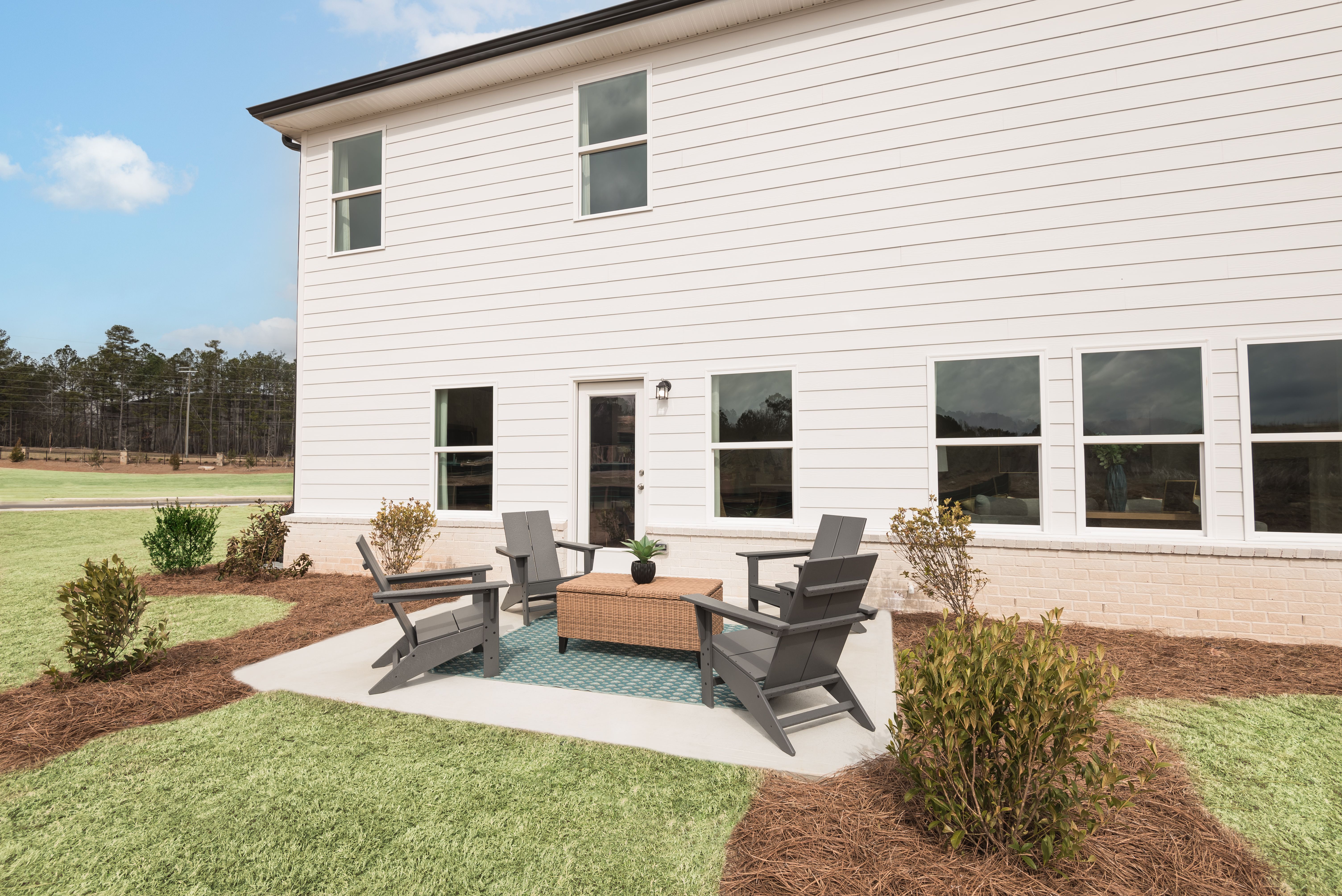 Back Patio:The Taylorsville floorplan with the Lush White interior package modeled at Parkside at Grayson.
