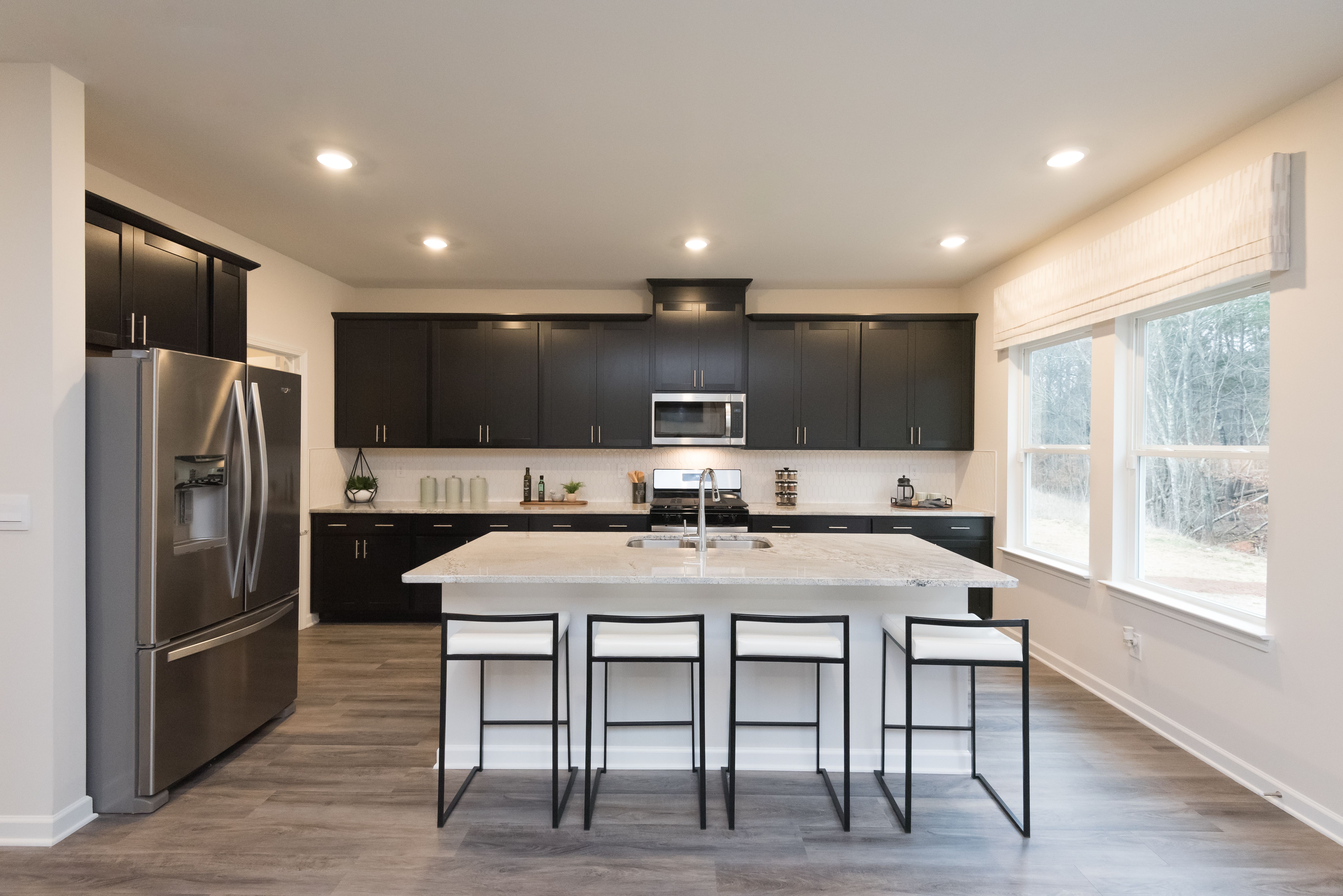 Kitchen:Welcome to the Dakota floorplan modeled at Oaks at Dawson.
