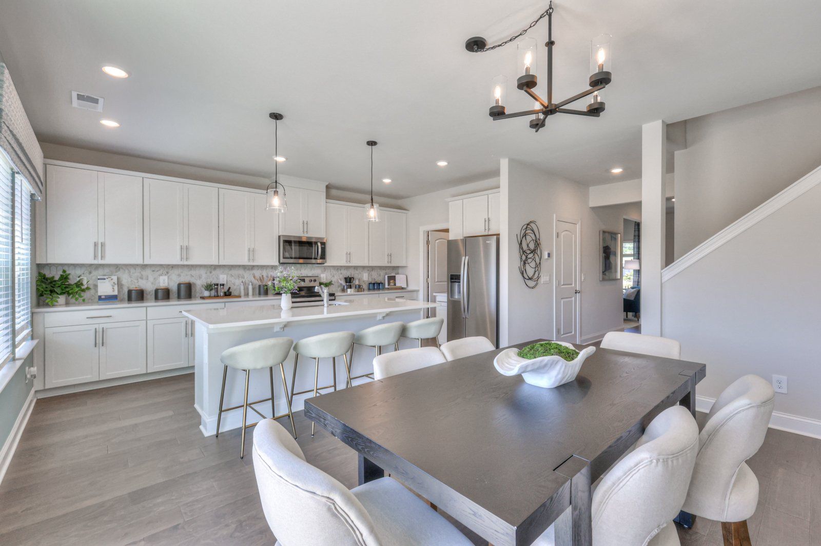 The stunning open-concept floorplan allows for easy flow between the kitchen and dining areas.