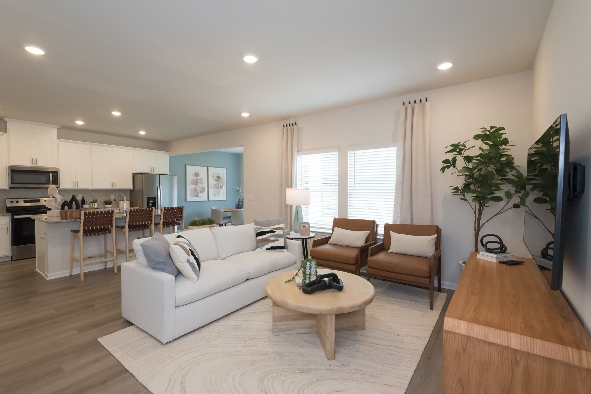 Enjoy an open-concept floorplan, where the kitchen overlooks the living and dining room.