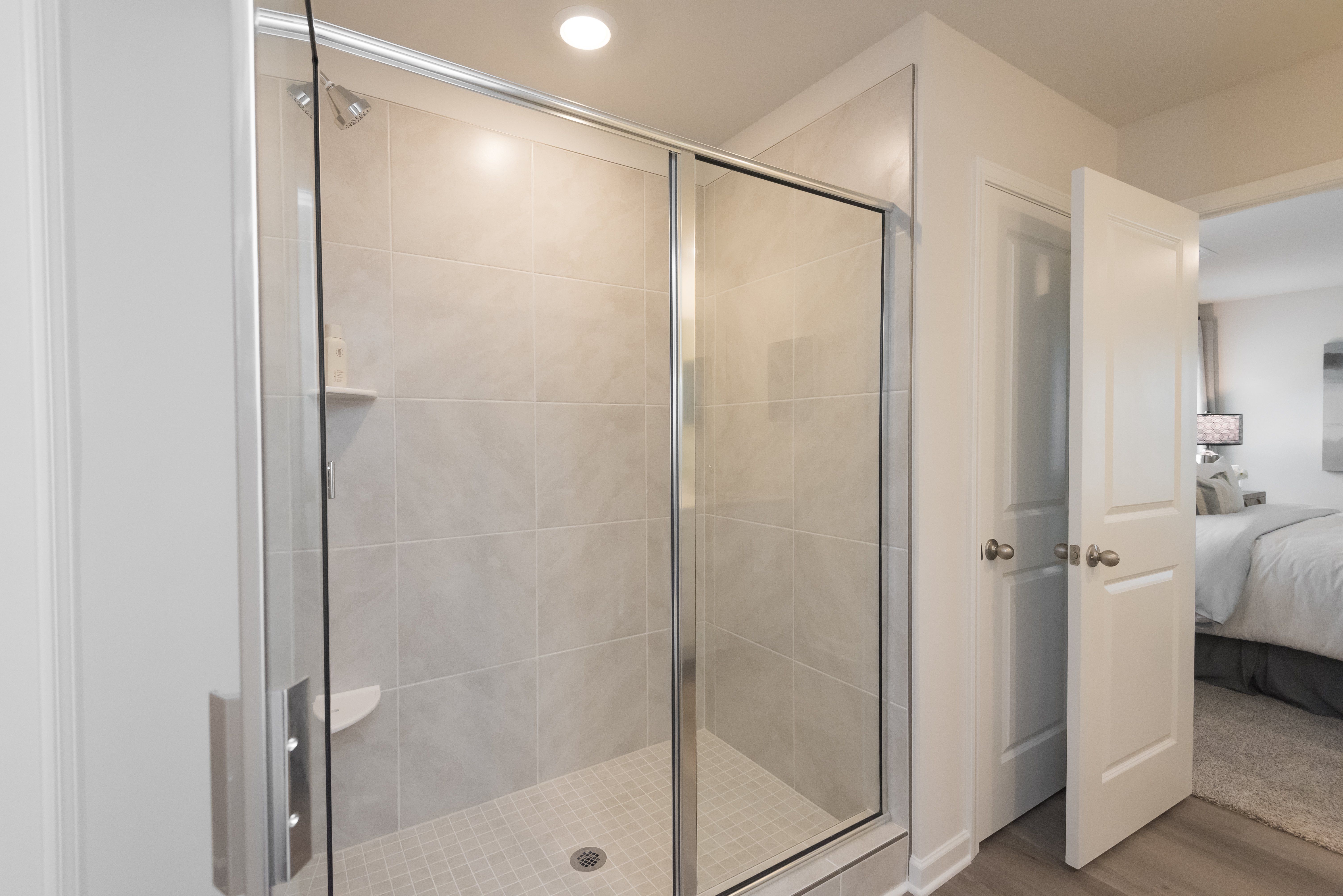 Primary Shower:The Dallas floorplan with the Elemental White interior packages modeled at Hawthorne Station