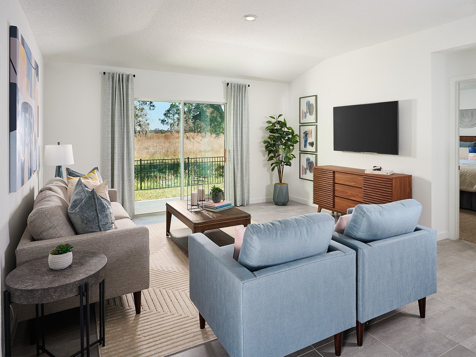 Living room modeled at Lakes at Bella Lago.:Living room modeled at Lakes at Bella Lago.